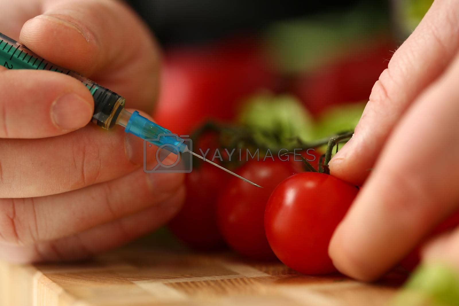 Royalty free image of Cook in kitchen introduces secret ingredient by kuprevich