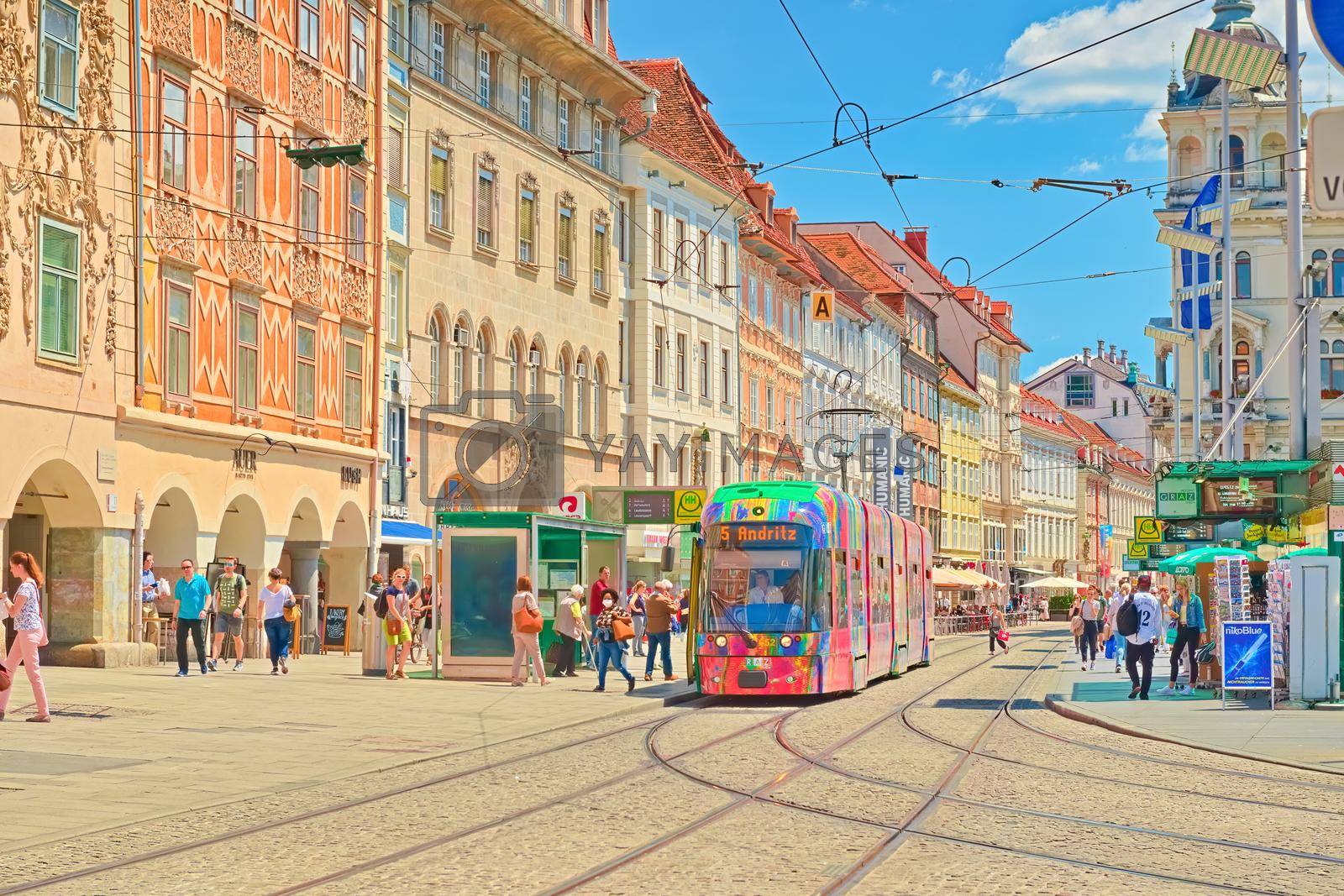 Royalty free image of Graz - June 2020, Austria: View of the city center of Graz with modern tram, tram lines, tram station and beautiful old buildings in the traditional architectural style by travellaggio