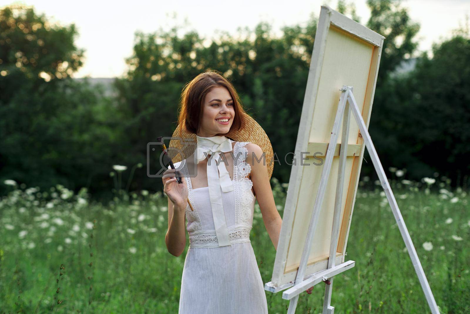 Royalty free image of woman artist outdoors visage creative hobby lifestyle by Vichizh