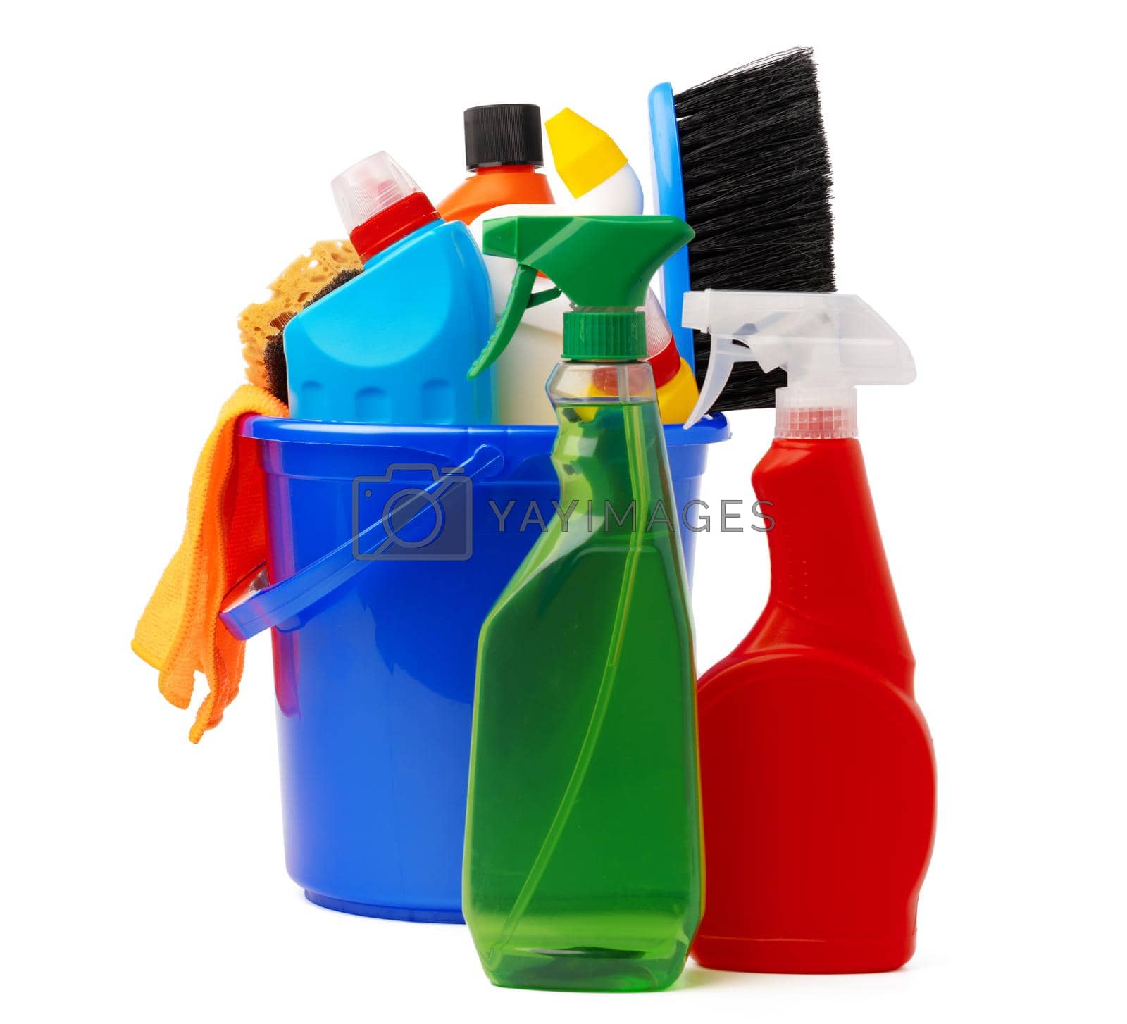 Royalty free image of Liquid detergents and cleaning supplies in plastic bucket on white background by Fabrikasimf