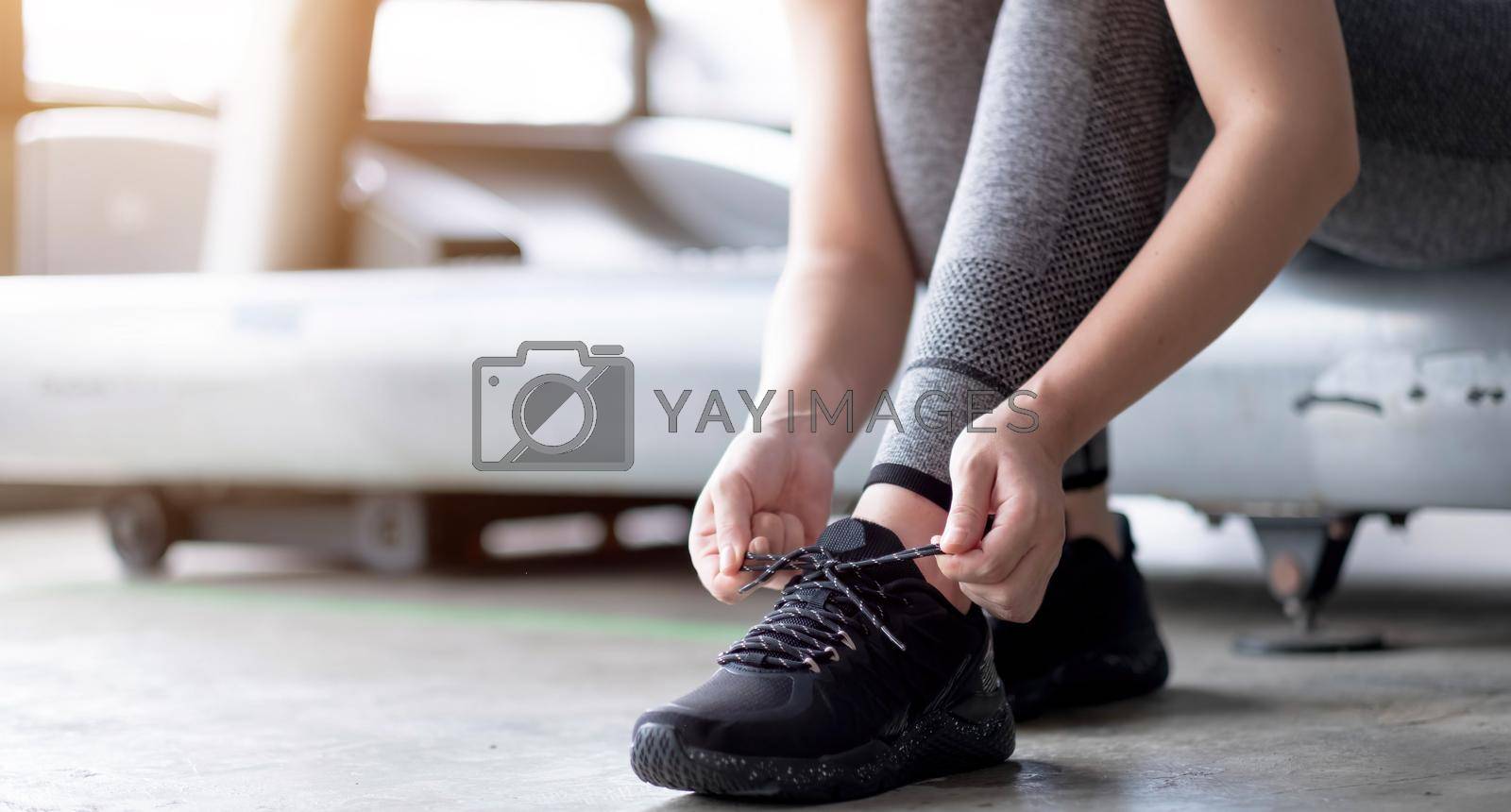 Sports Shoes. Woman Hands Tying Shoelaces On Fashion Sneakers.