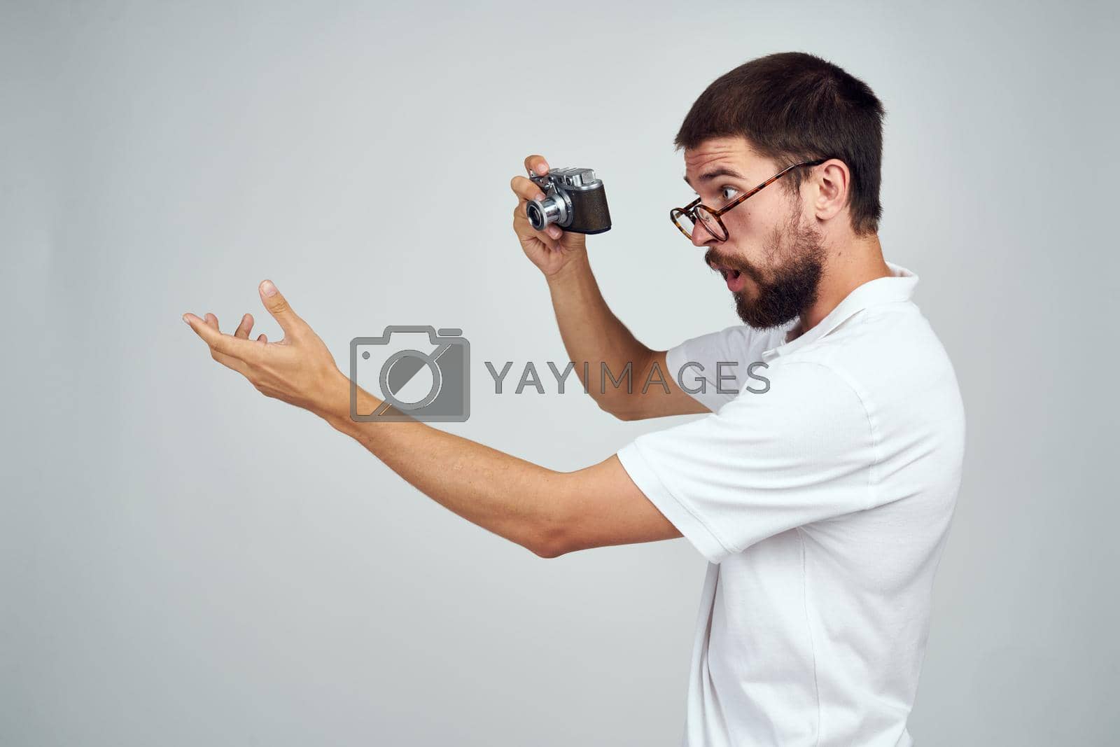 male photographer with camera office object lifestyle. High quality photo