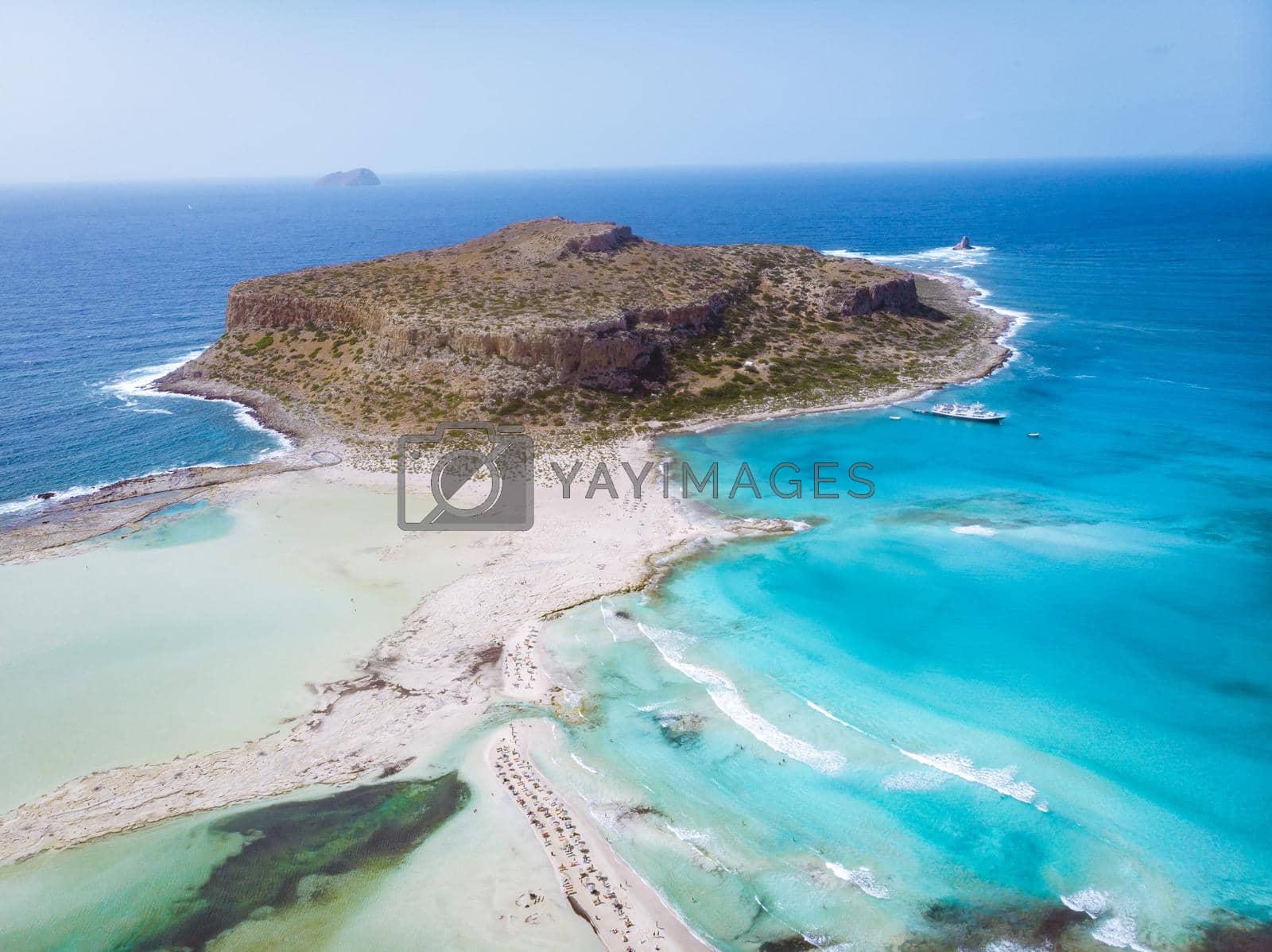 Royalty free image of Crete Greece, Balos lagoon on Crete island, Greece. Tourists relax and bath in crystal clear water of Balos beach. by fokkebok