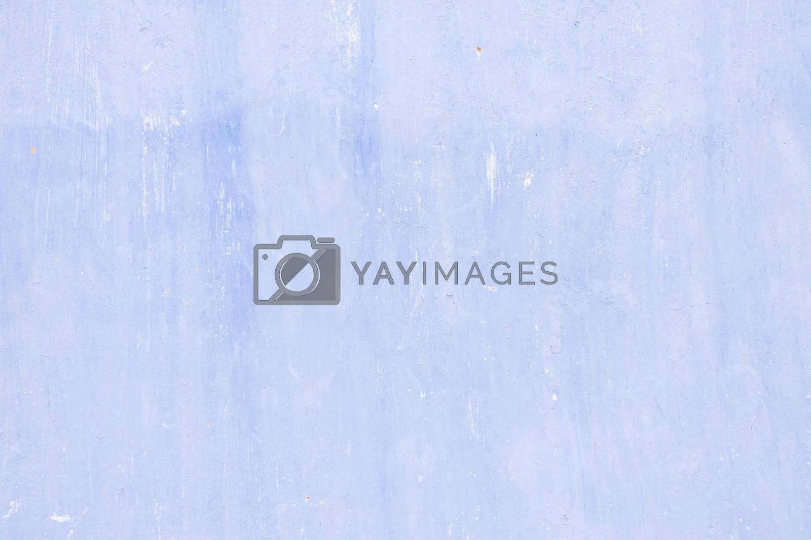 Royalty free image of Old texture turquoise light blue cracked wall, the old paint texture is chipping and cracked fall destruction by nandrey85
