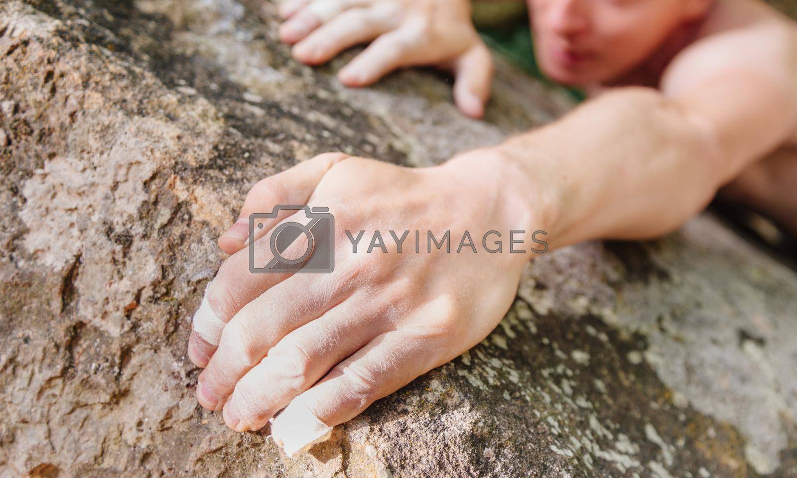 Royalty free image of Climbing on rock wall. by alexAleksei