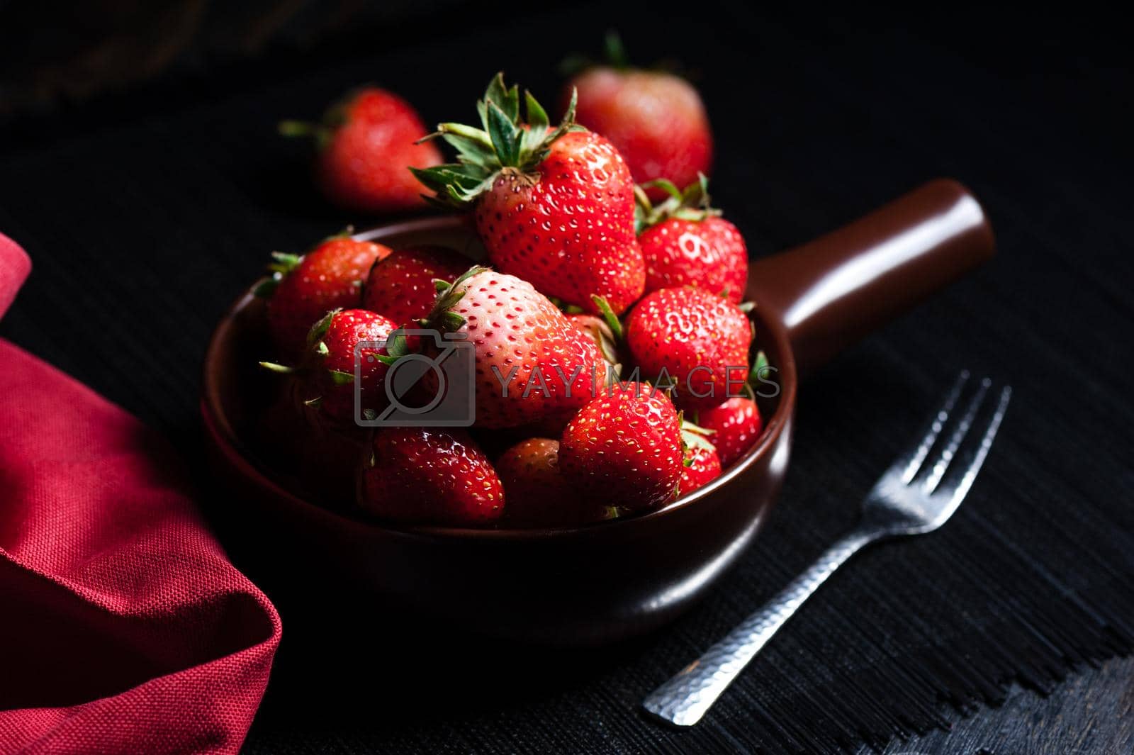 Royalty free image of eating fresh strawberry by norgal