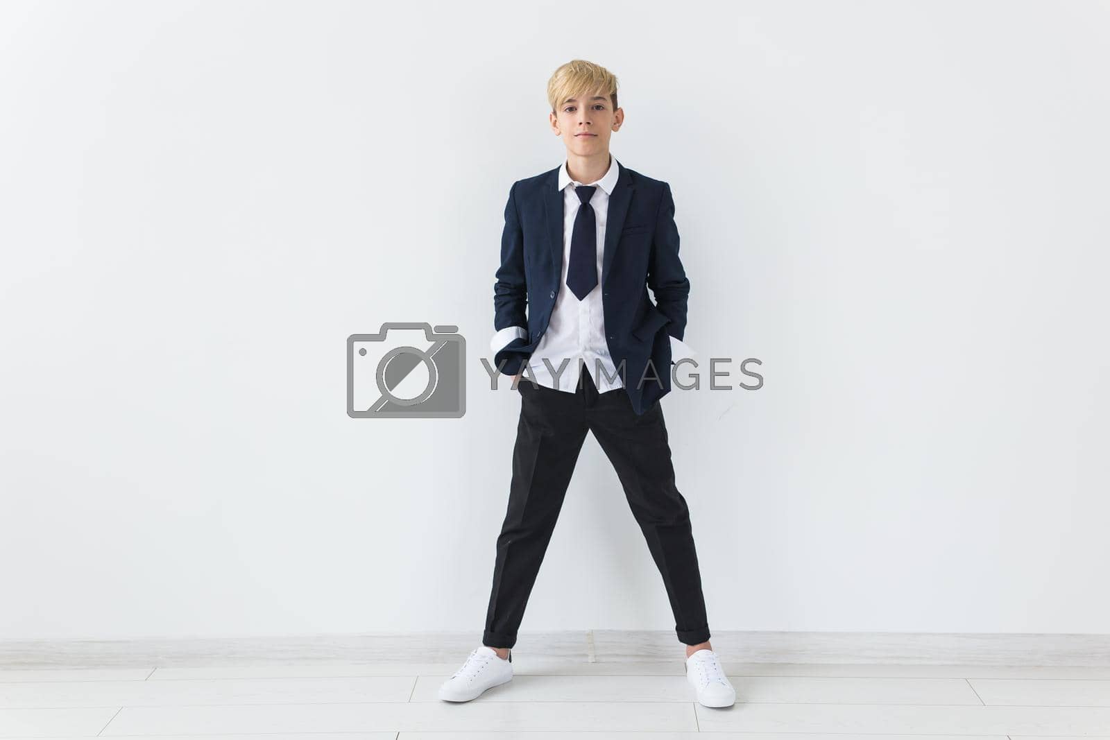 Royalty free image of Teenage depression and puberty concept - Sad teenager portrait close up on white background. by Satura86