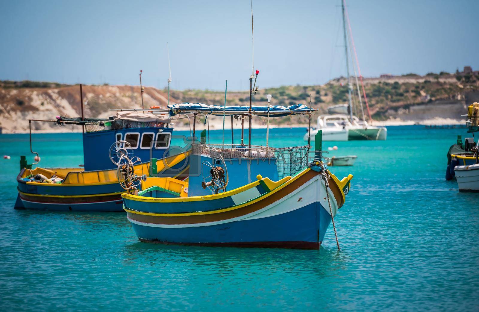 Royalty free image of fishing boats near village of Marsaxlokk by GekaSkr