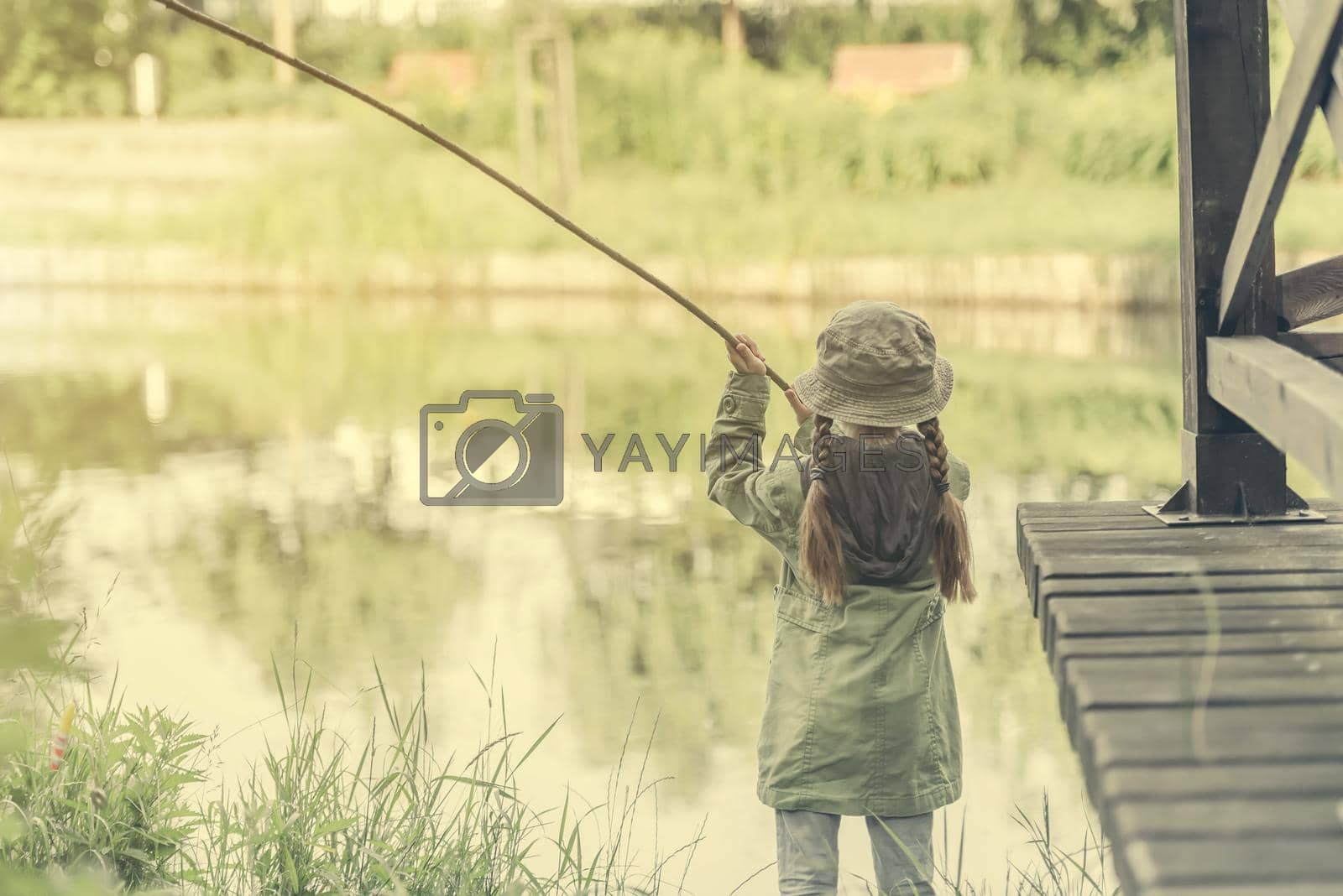 Royalty free image of little fisher girl by GekaSkr