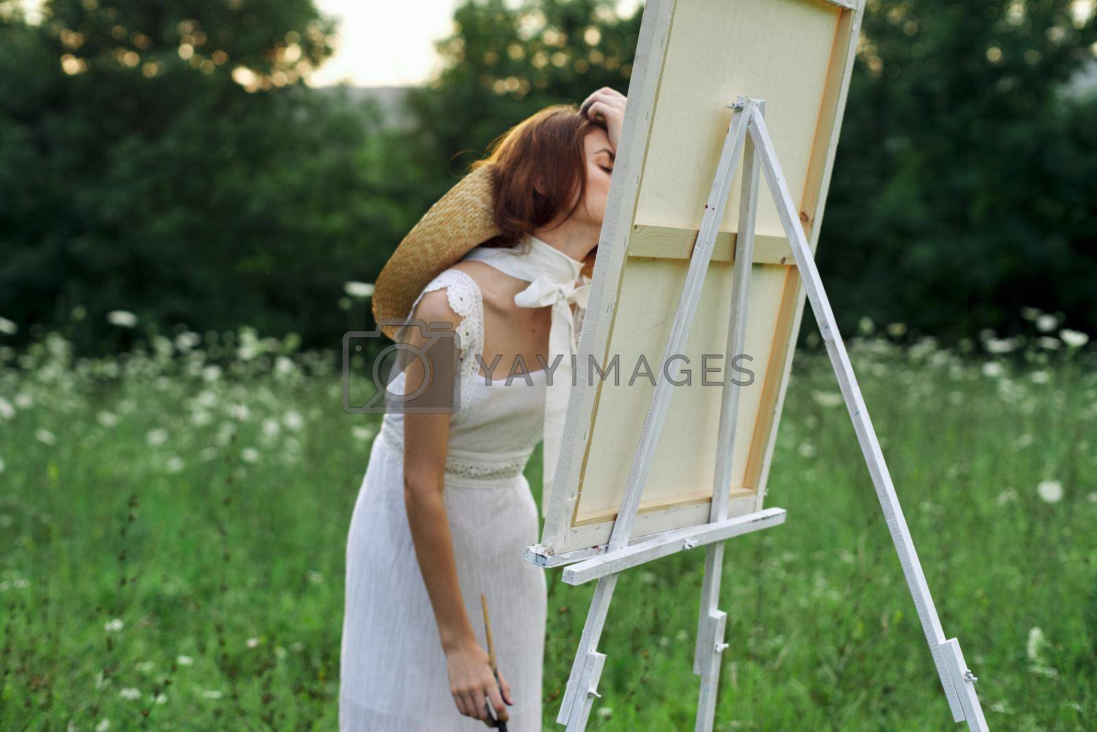 Royalty free image of woman artist outdoors visage creative hobby lifestyle by Vichizh