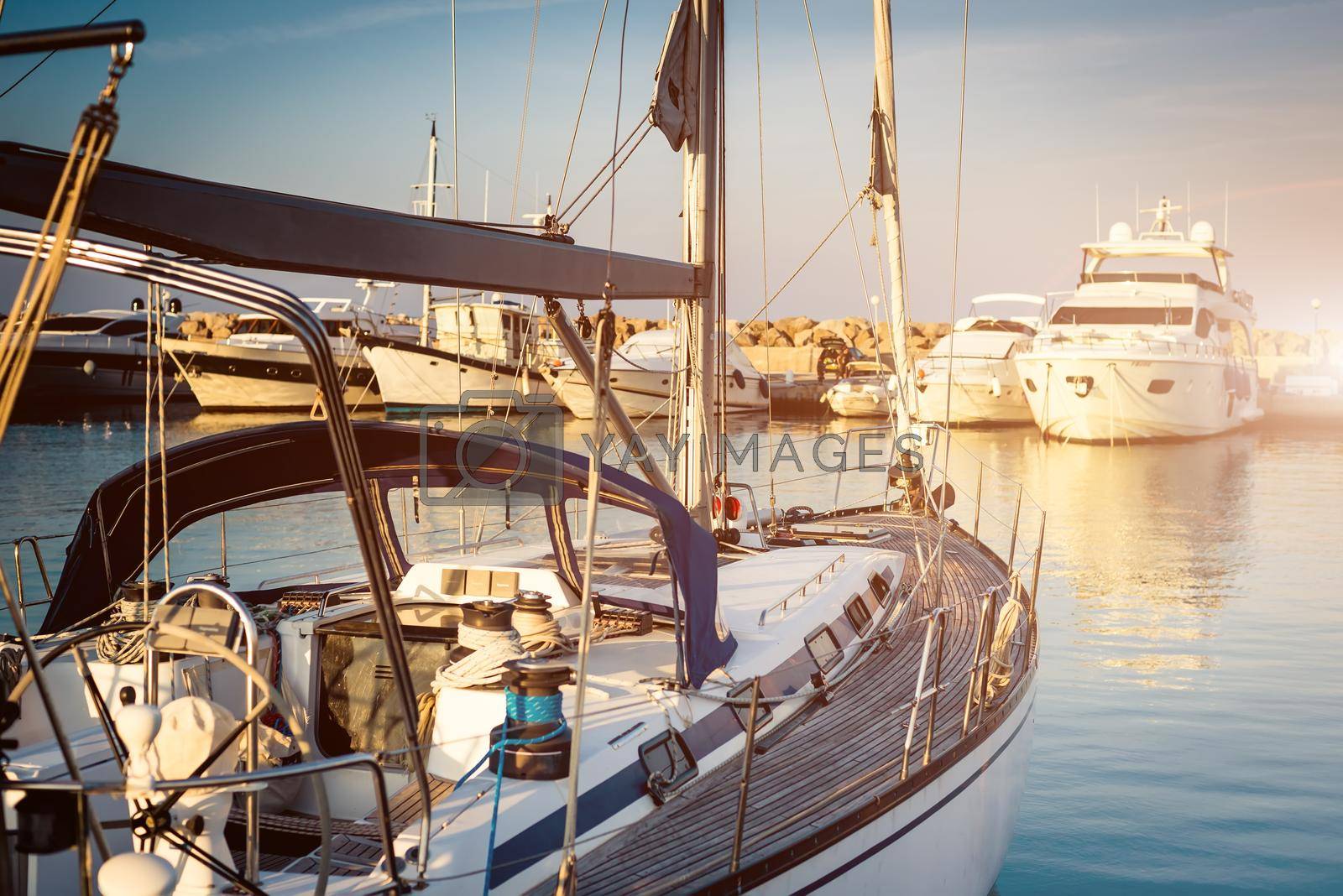 Royalty free image of yacht in a berth by GekaSkr