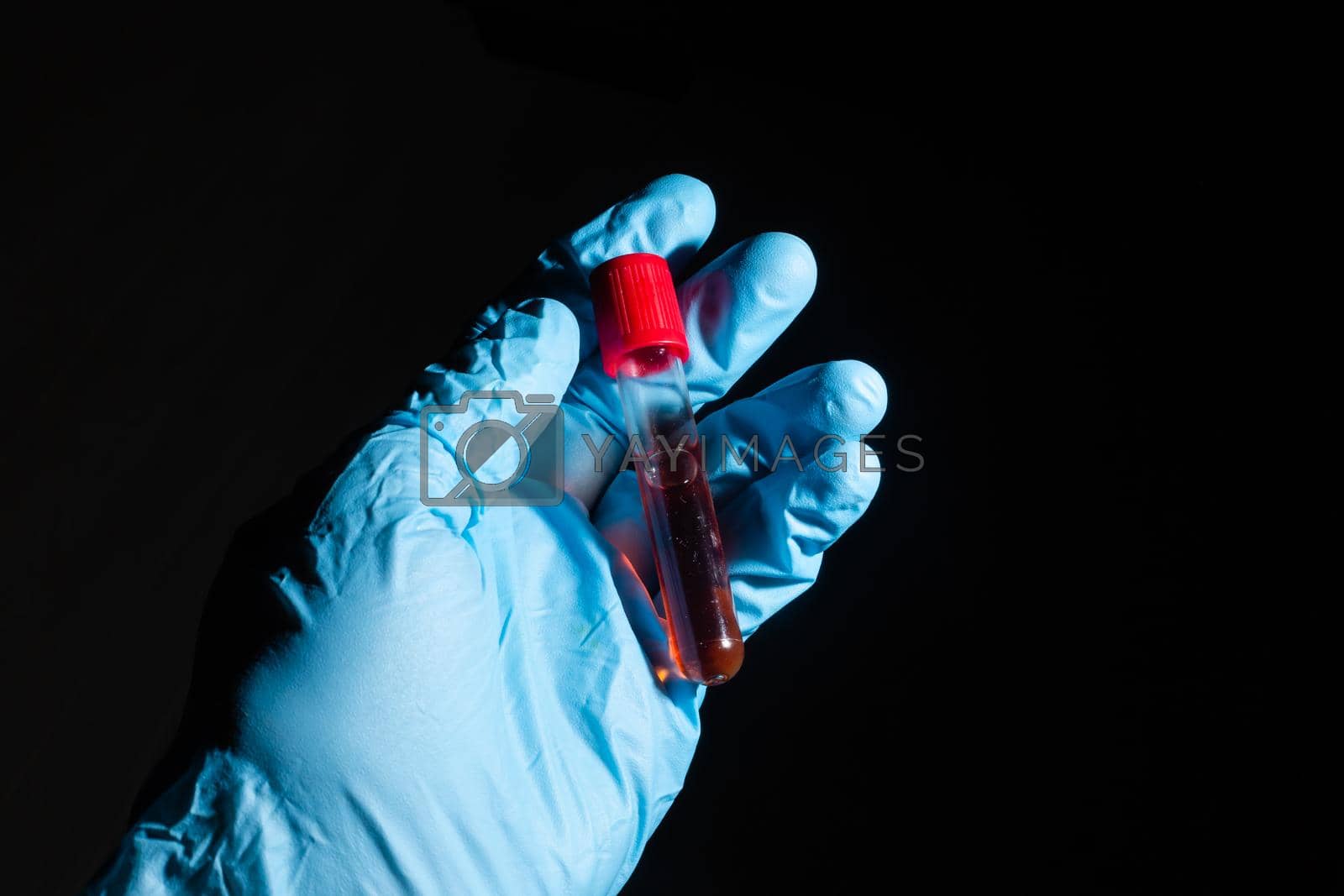 Royalty free image of Medical doctor or laborant holding tube with nCoV Coronavirus vaccine for 2019-nCoV COVID virus. Novel Coronavirus originating in Wuhan, China. Coronavirus 2019-nCoV COVID concept. by Andelov13