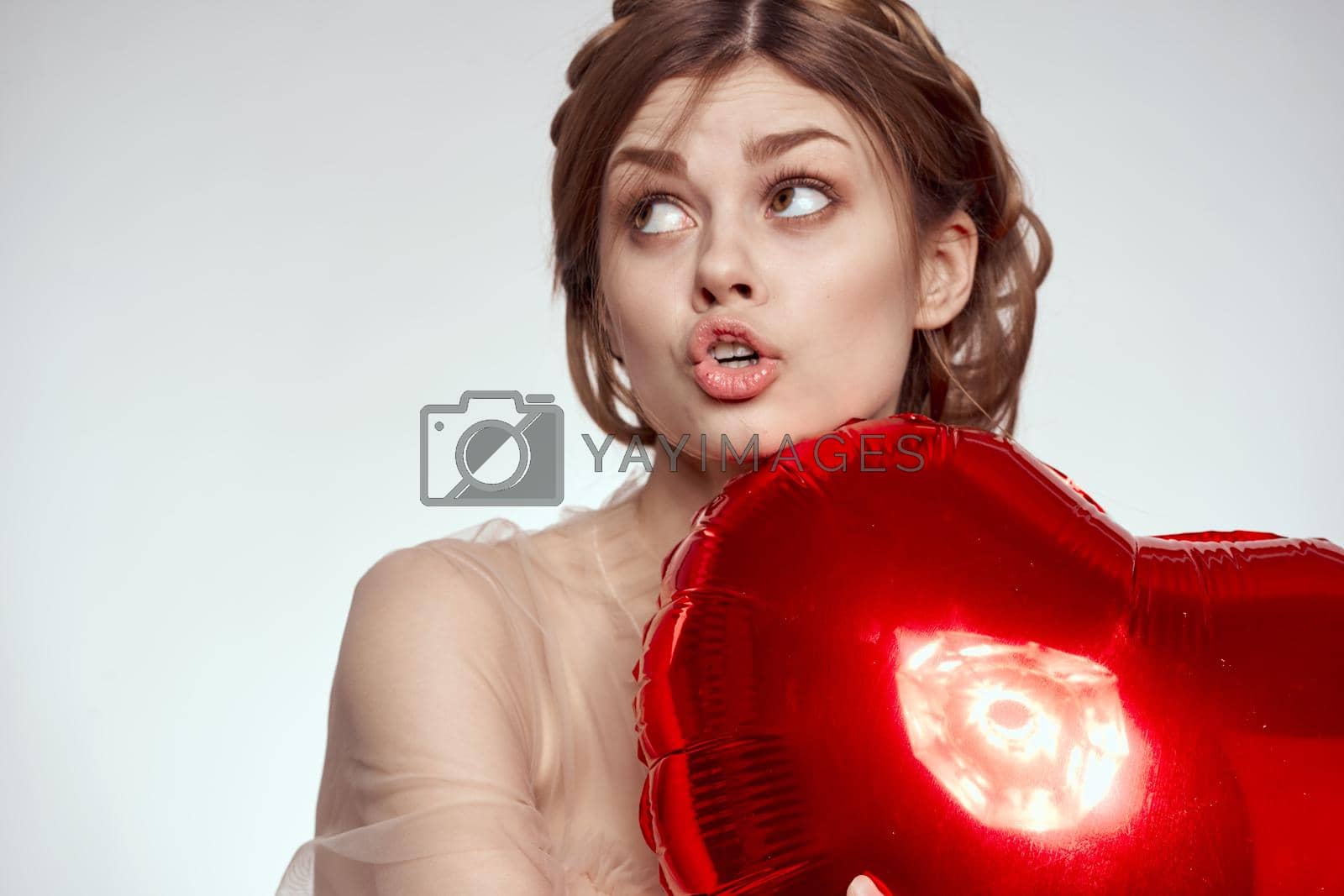 pretty woman heart balloon posing romance holiday. High quality photo