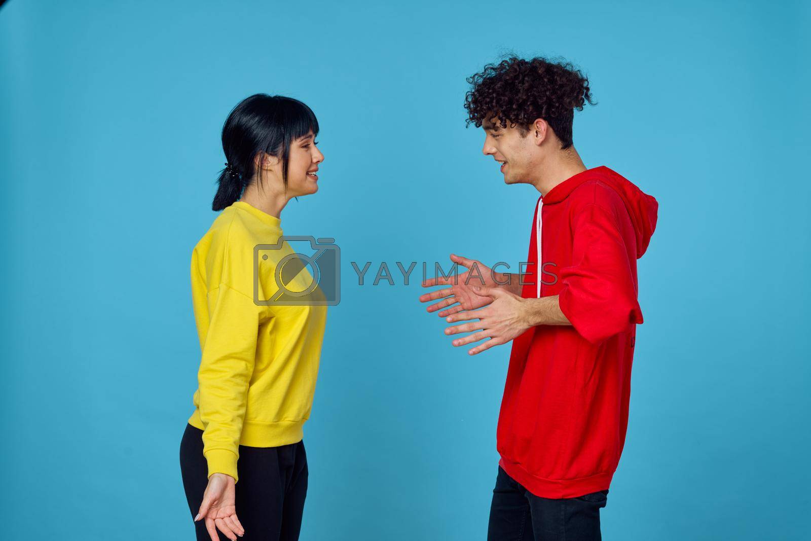 young couple in fashionable clothes posing together emotions lifestyle. High quality photo