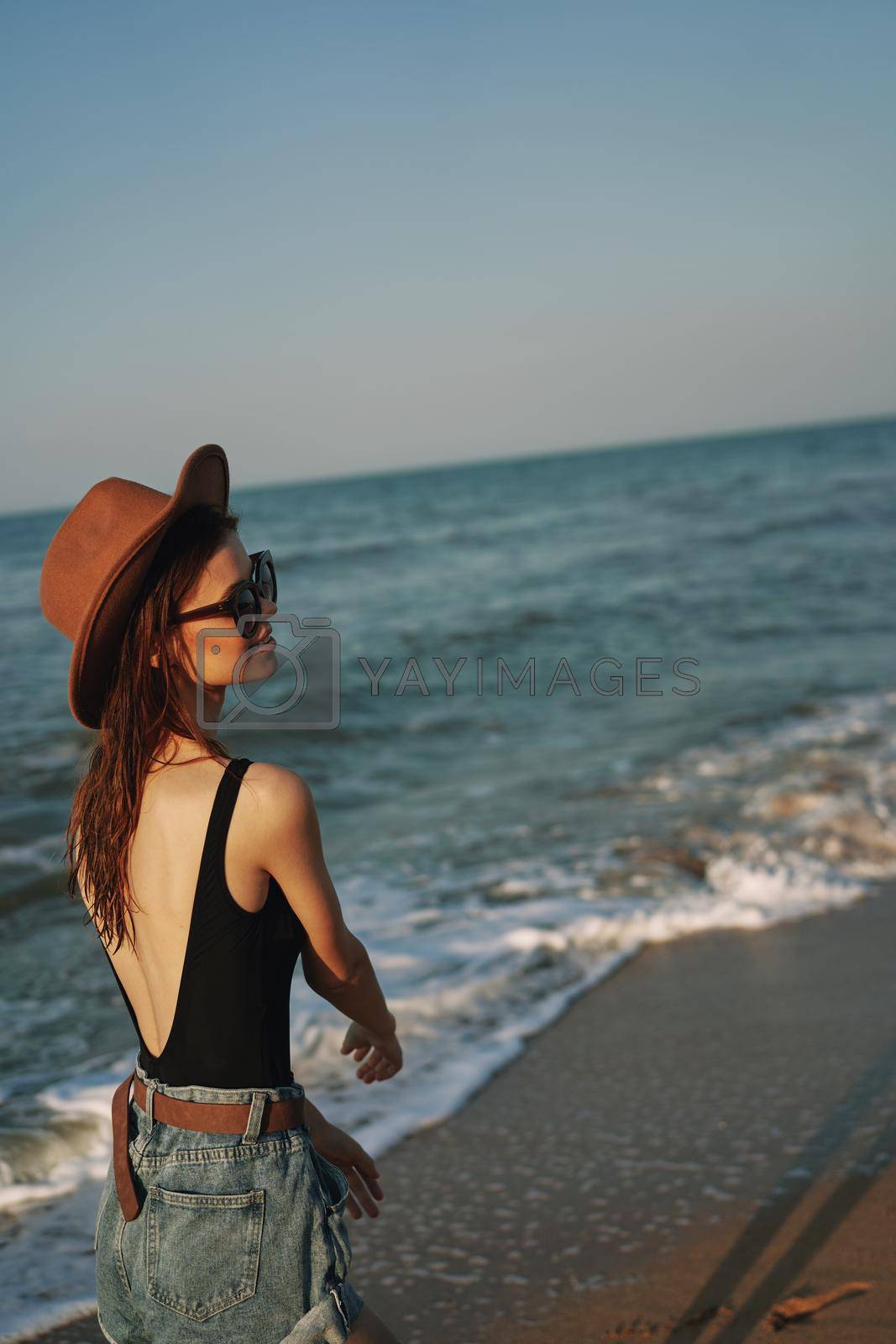 woman in sunglasses near car travel summer vacation landscape. High quality photo