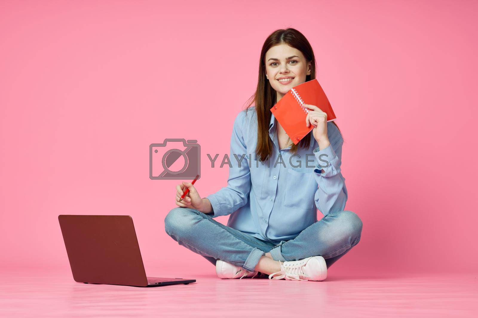 student laptop education internet pink technology background. High quality photo