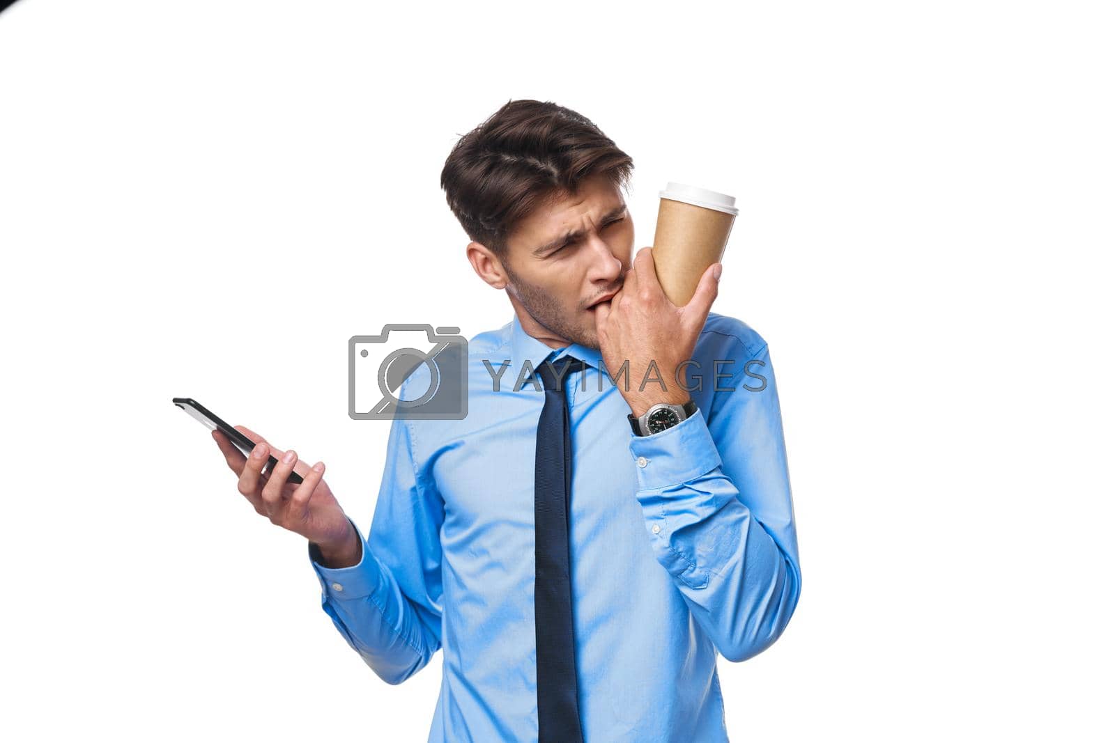 a person communication on the phone a cup of coffee isolated background. High quality photo