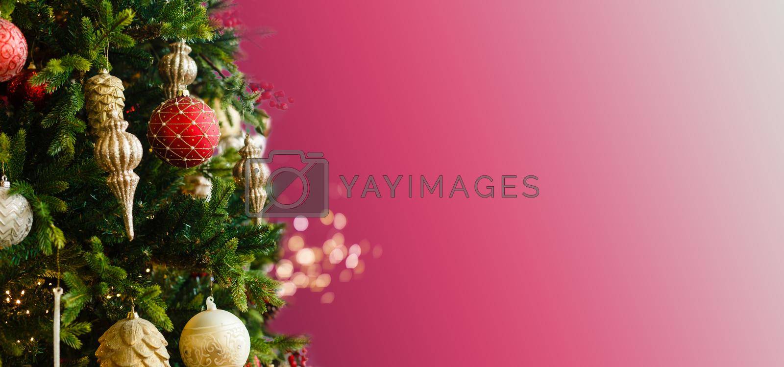 Royalty free image of Decorated Christmas tree closeup, balls, garland by Andelov13