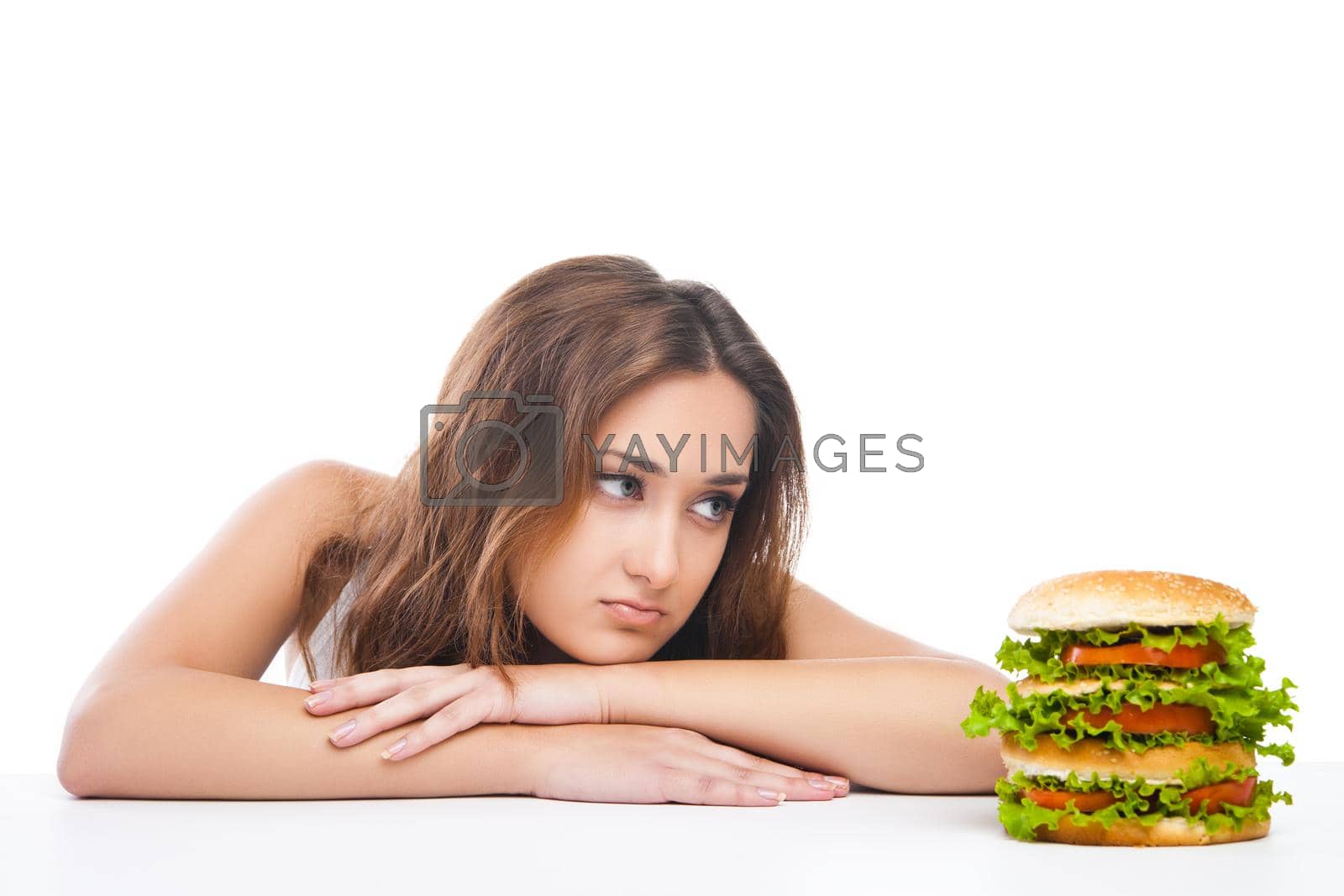 Royalty free image of Healthy woman rejecting junk food isolated by Julenochek