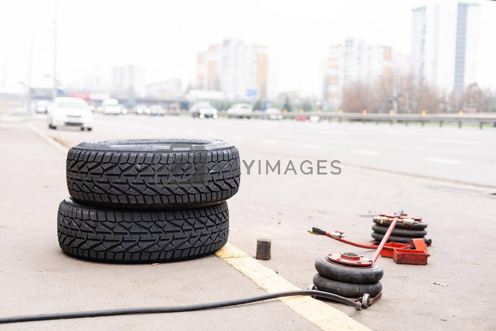 Royalty free image of Equipment for car service and repair, tire machine for balancing automotive wheels, balancing stand, closeup by Andelov13