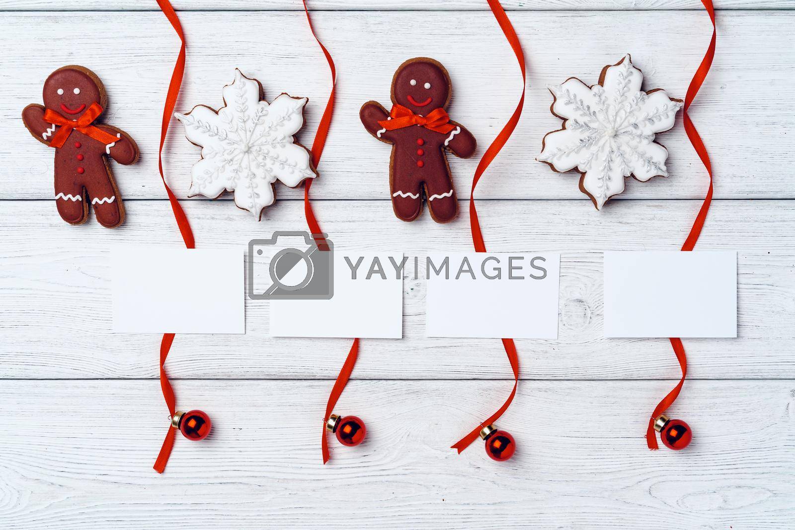 Royalty free image of New year greeting background with red ribbons and baubles by Fabrikasimf
