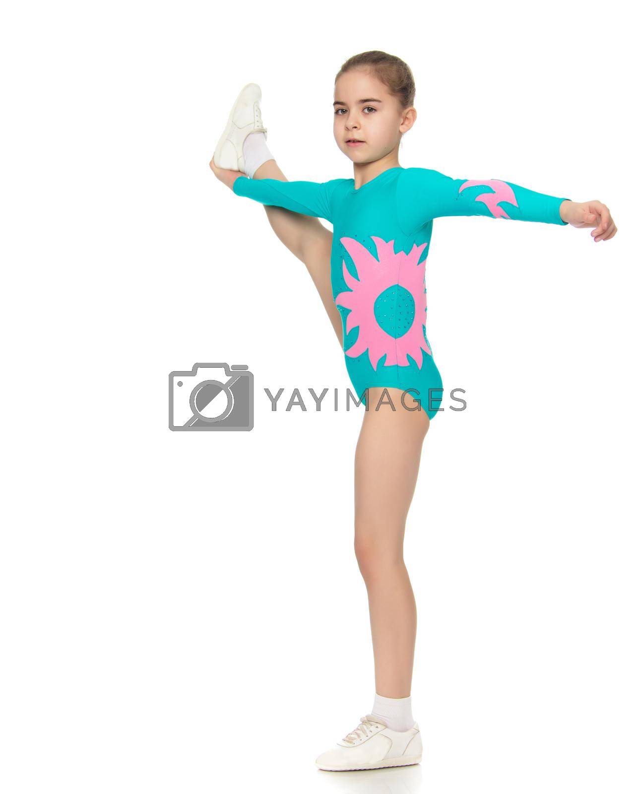 Royalty free image of Young girl acrobat perform exercises. by kolesnikov_studio