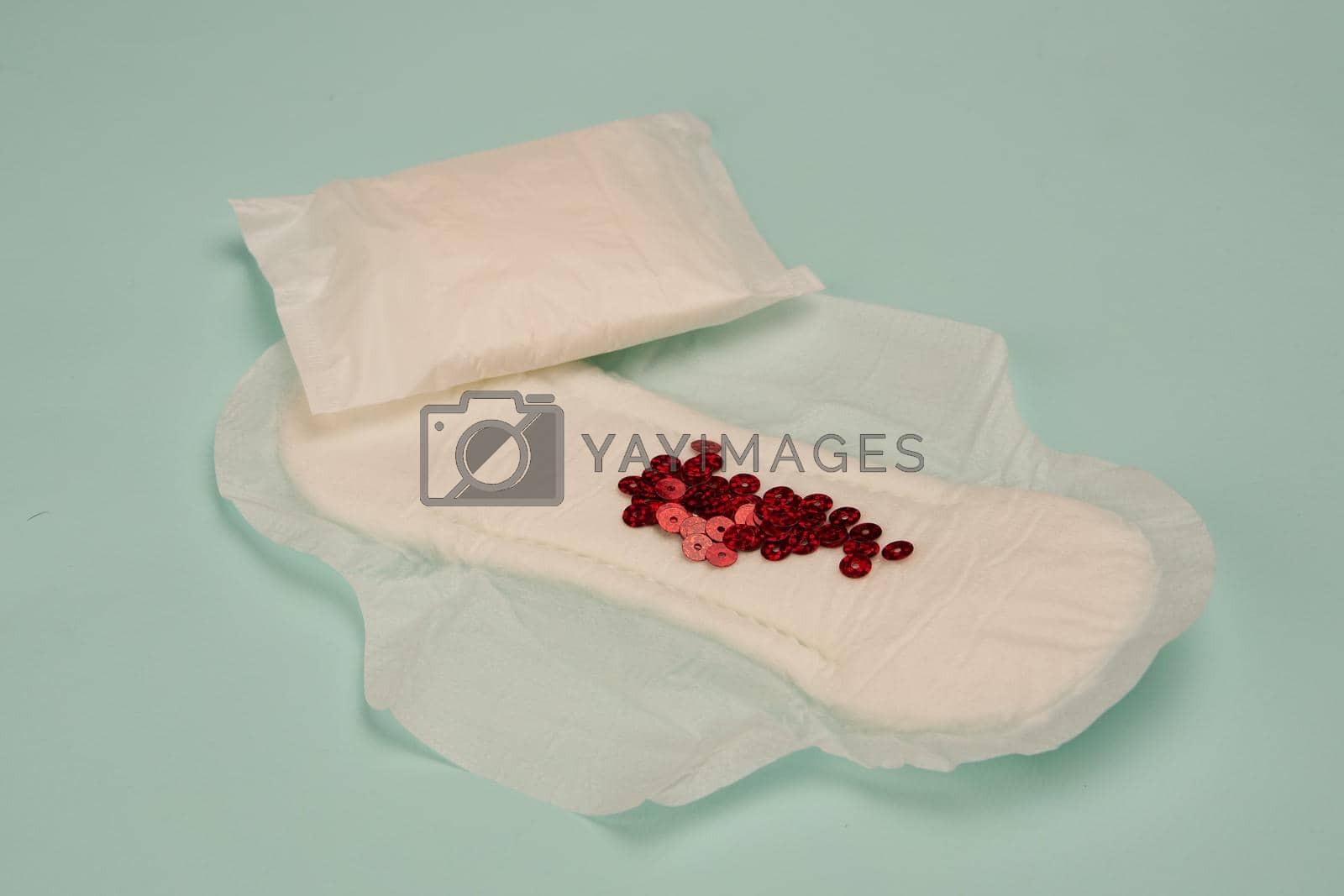 Royalty free image of strip blood feminine hygiene menstruation protection top view by Vichizh