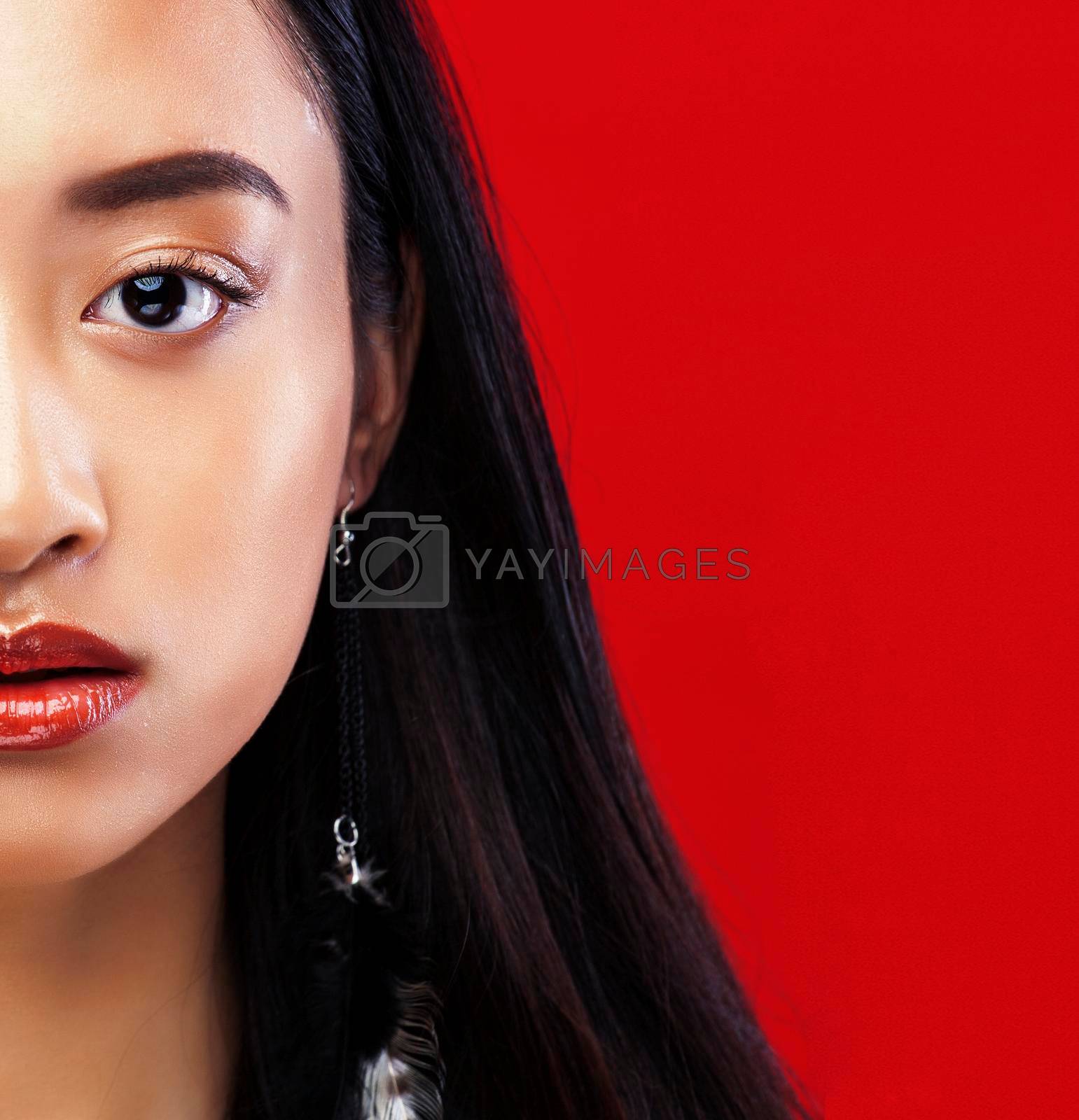 beauty young asian girl with fashion make up on red background , beauty stylish look close up