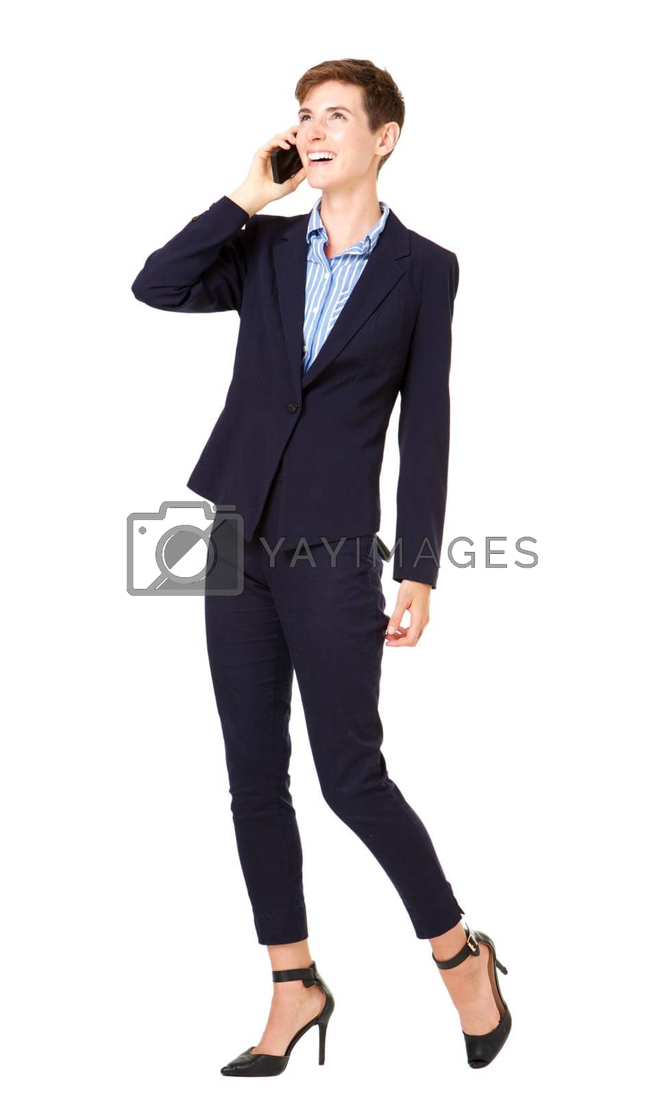 Royalty free image of Full body businesswoman in formal suit talking on mobile phone  by mimagephotography
