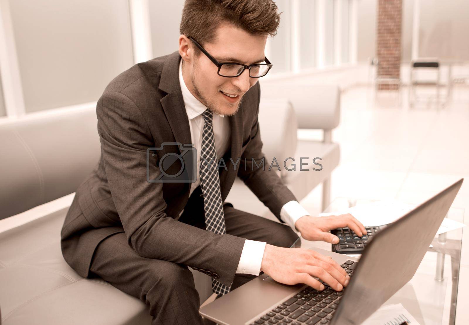 young businessman checking financial report.photo with copy space