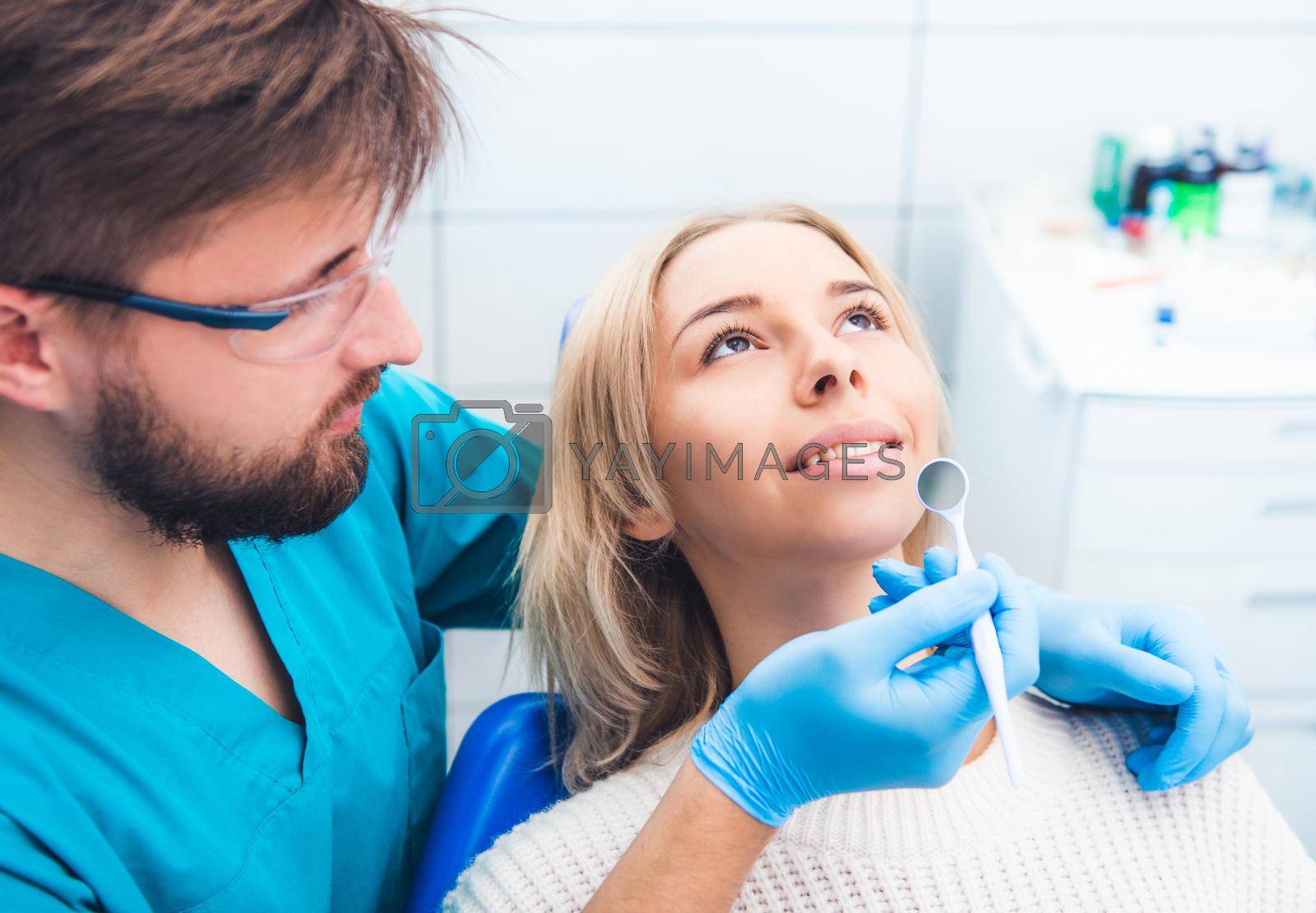 Patient and dentist in the dental office