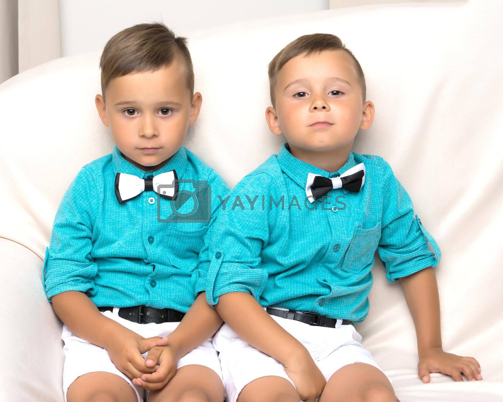 Royalty free image of Two sad Gemini boys by kolesnikov_studio
