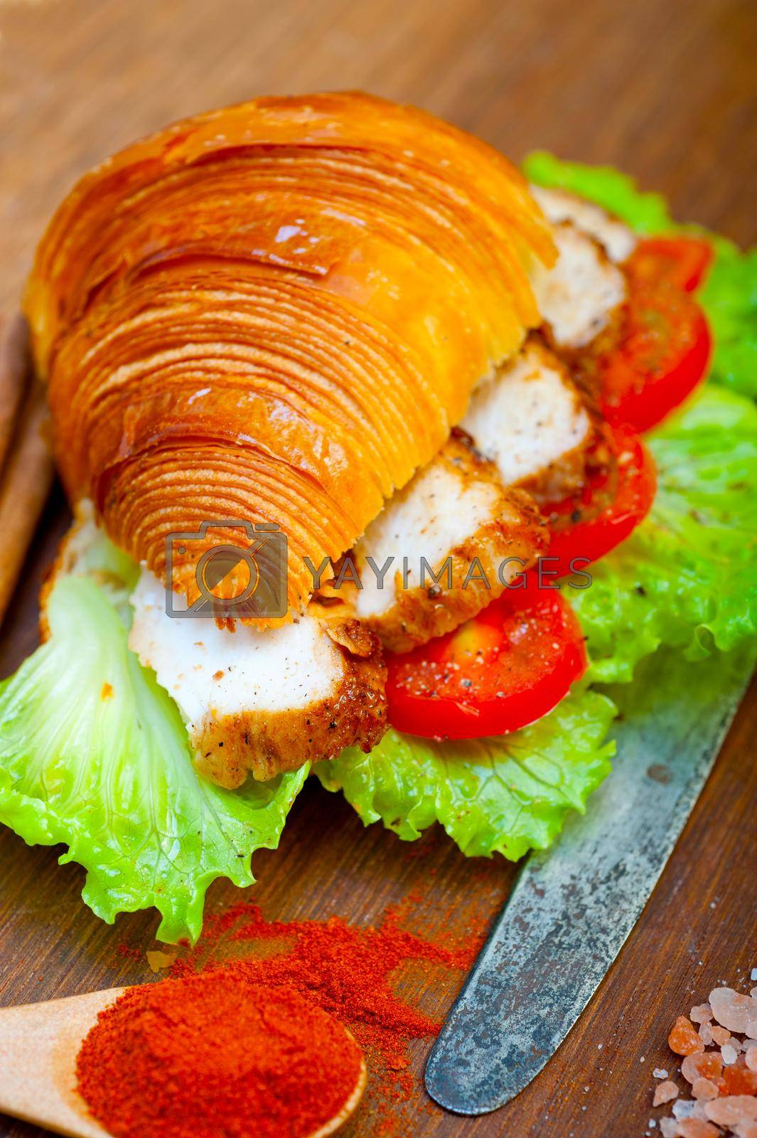 Royalty free image of savory croissant brioche bread with chicken breast  by keko64
