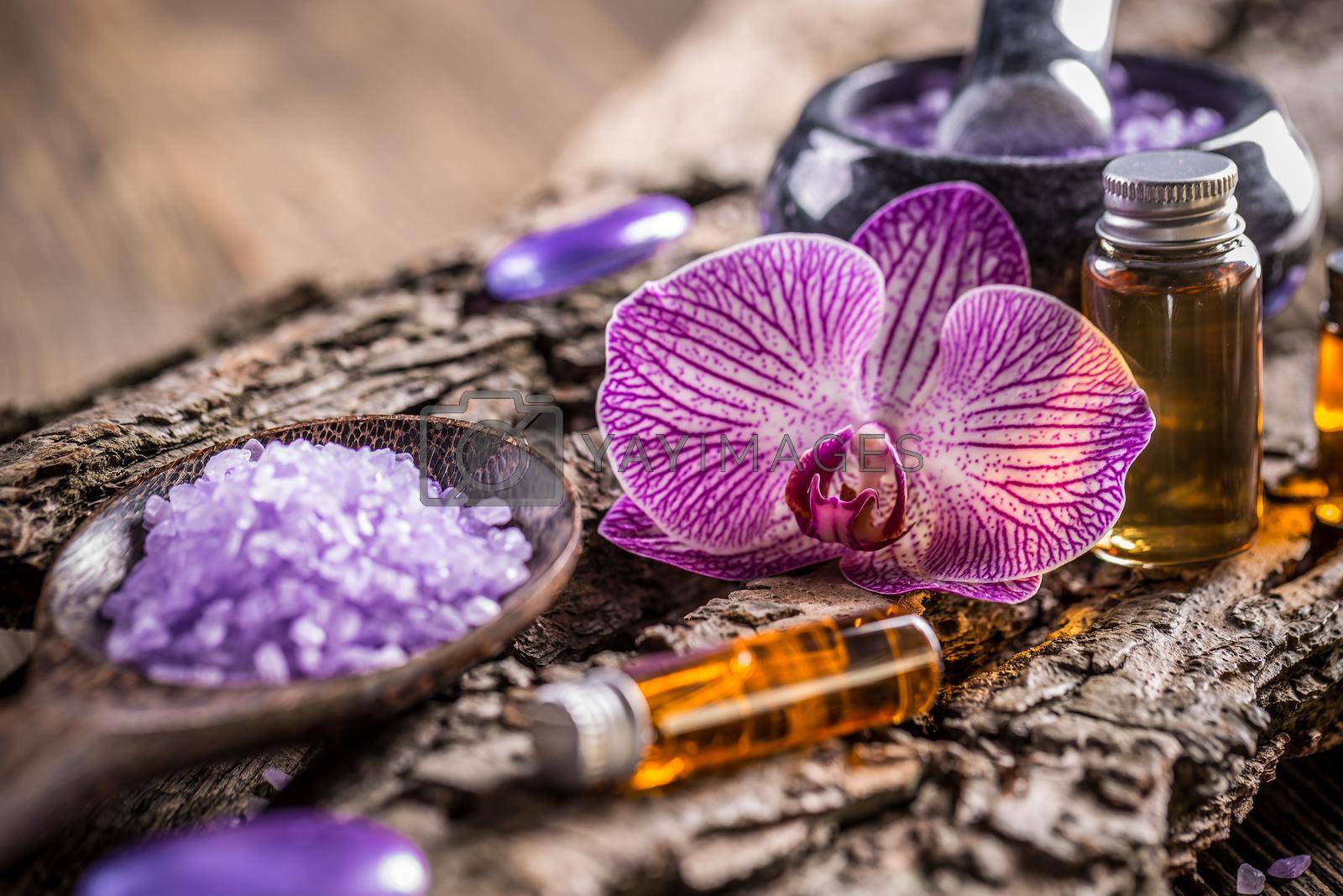 Beauty treatment concept, aromatherapy oil and lavender bath salt