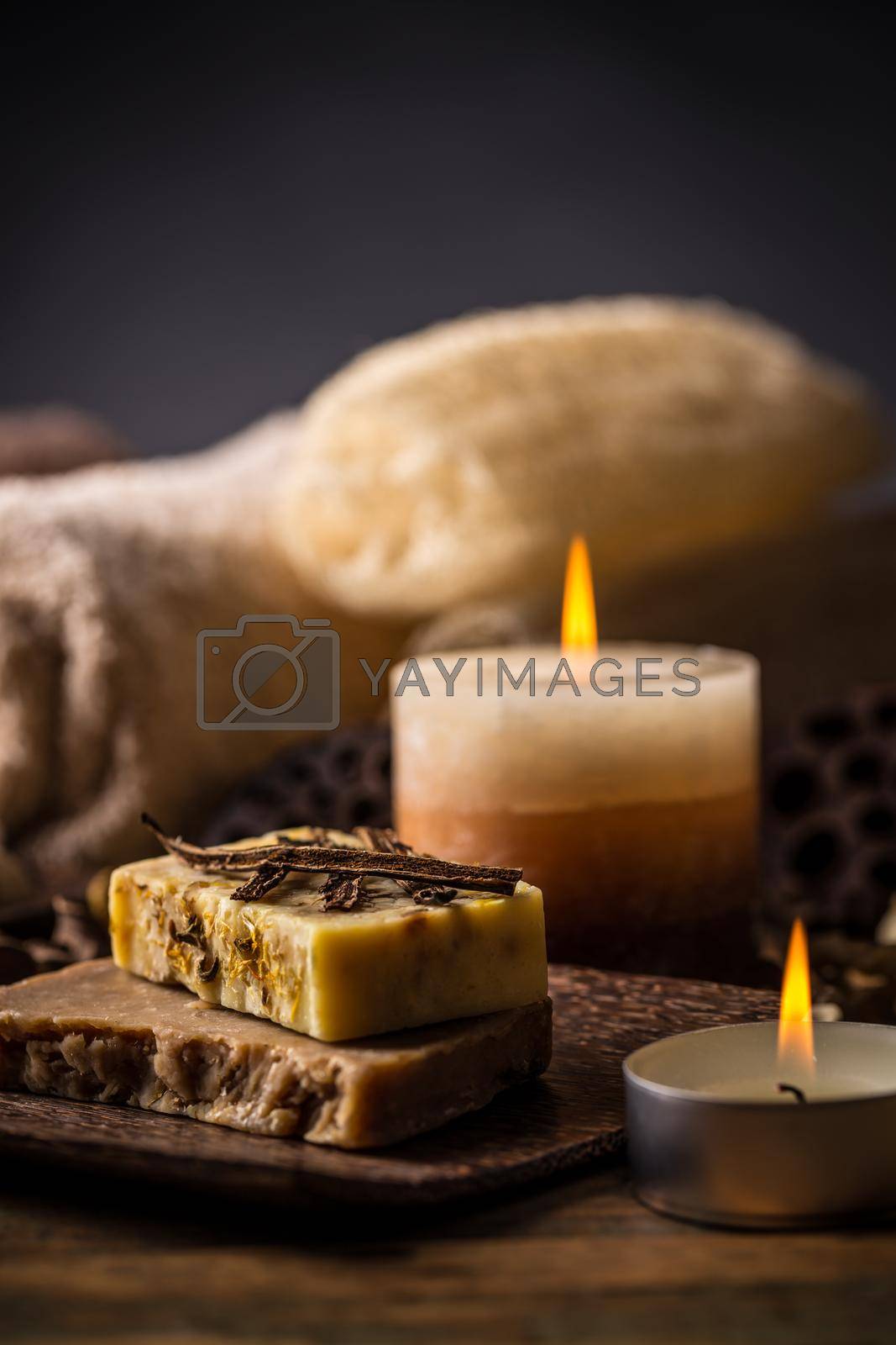 Spa concept with handmade soap and burning candle