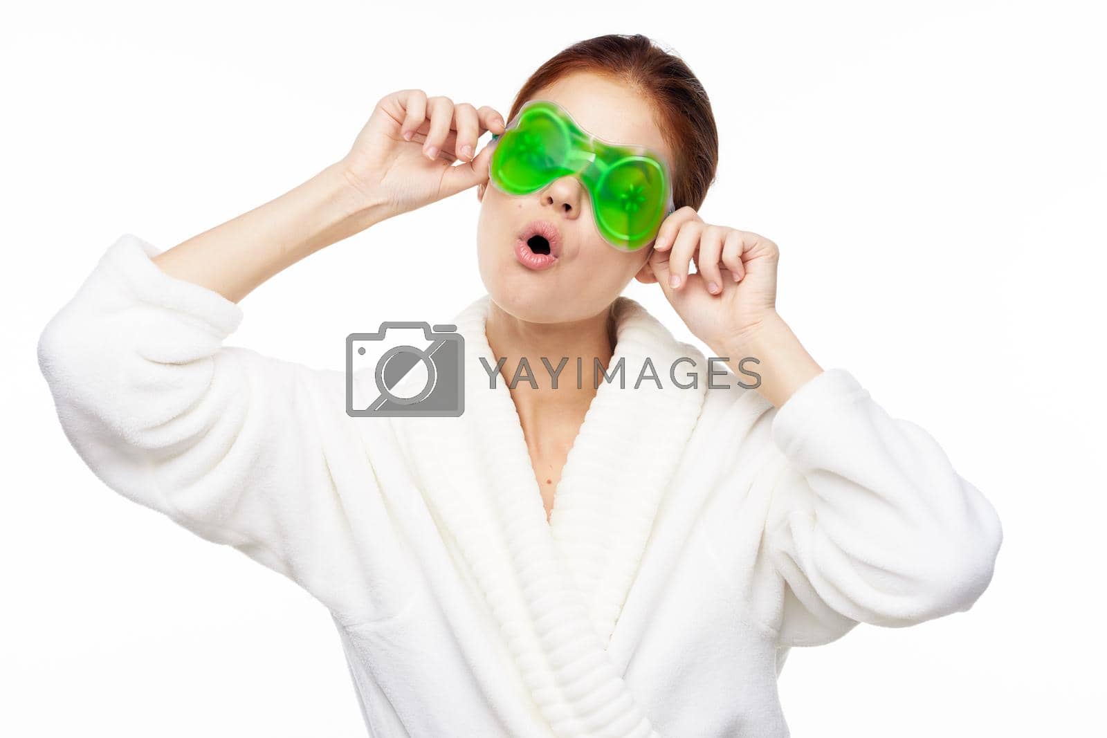 Royalty free image of Woman in white robe skin care spa treatments cosmetology by Vichizh