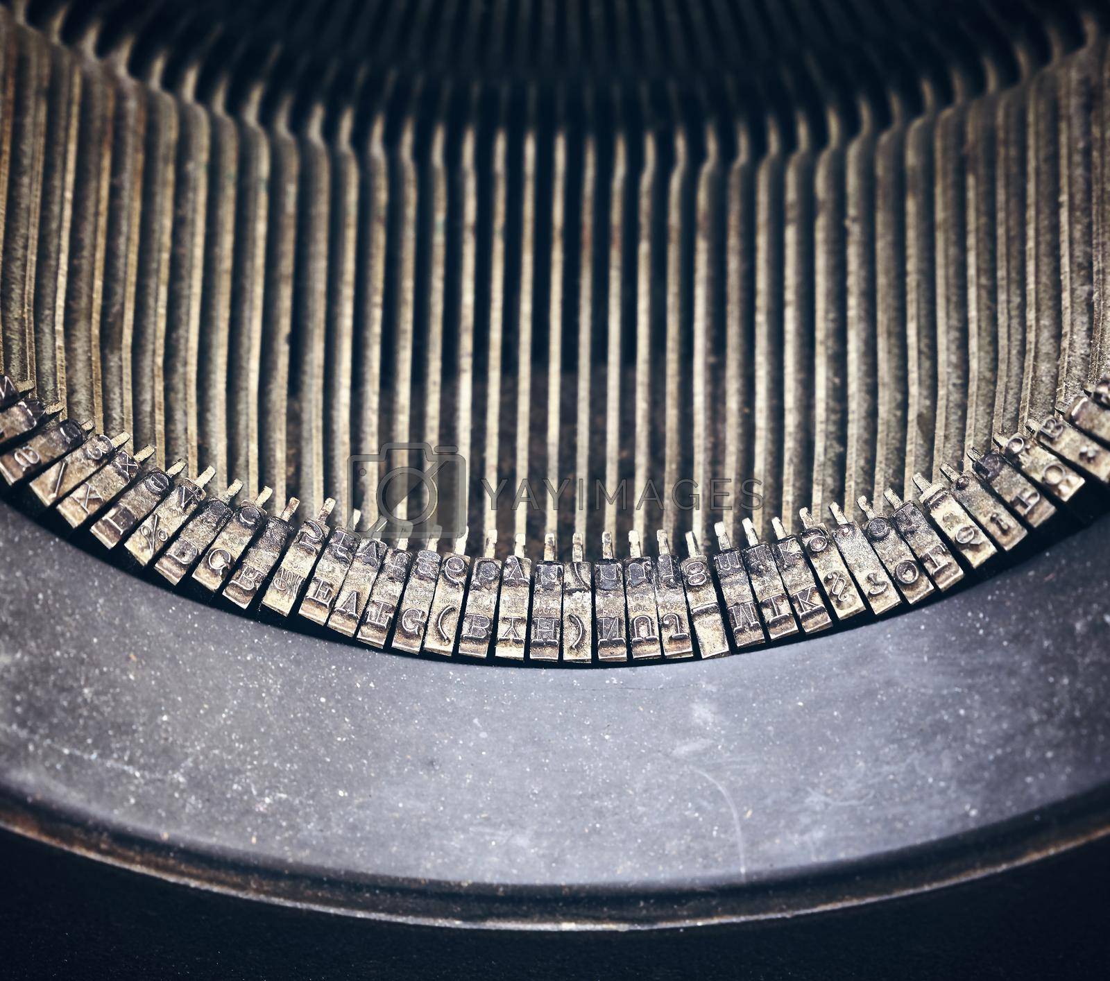 Royalty free image of Old vintage typewriter letter type bar close up by BreakingTheWalls