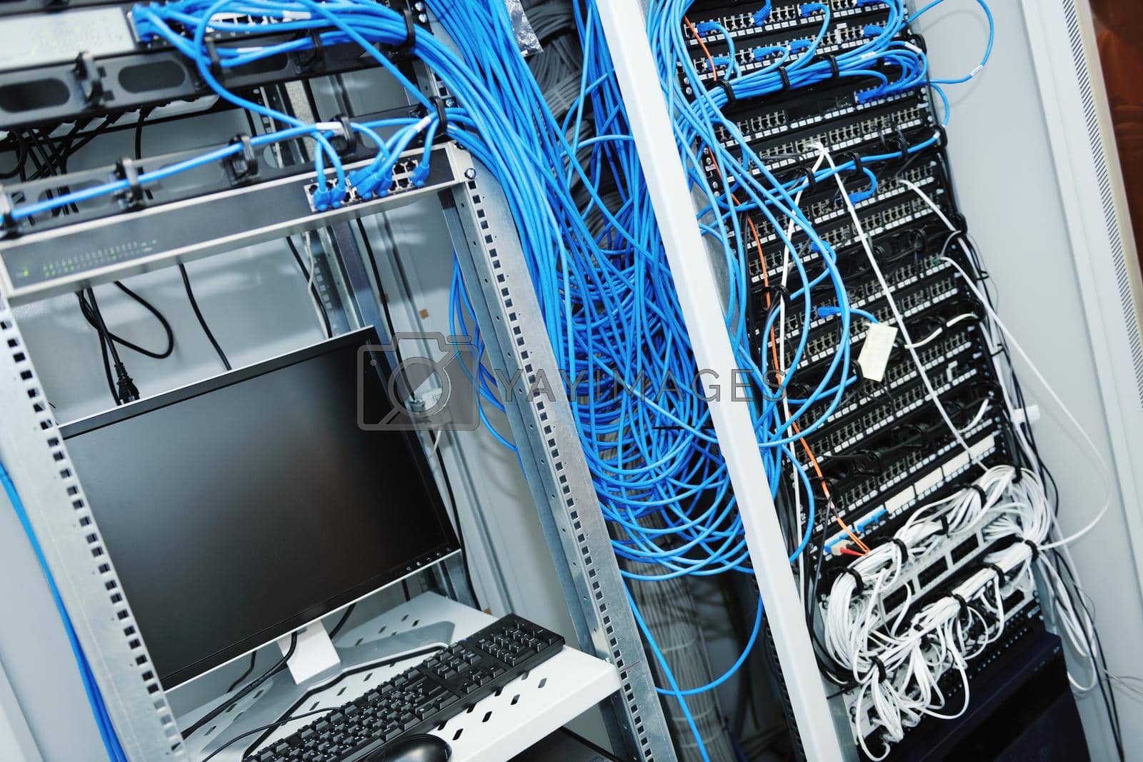 Royalty free image of network server room routers by dotshock