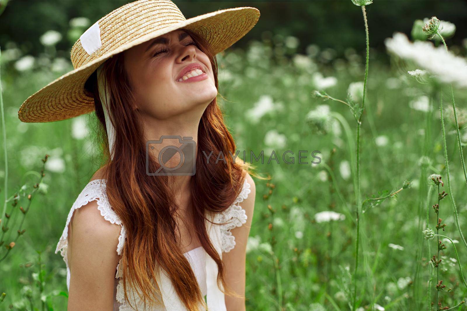 Cheerful woman nature flowers posing freedom fashion. High quality photo