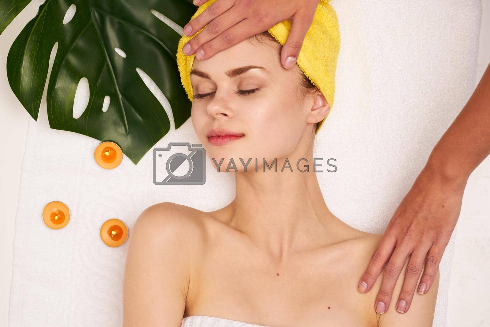 Royalty free image of pretty woman spa treatments cosmetics beauty saloon close-up by Vichizh