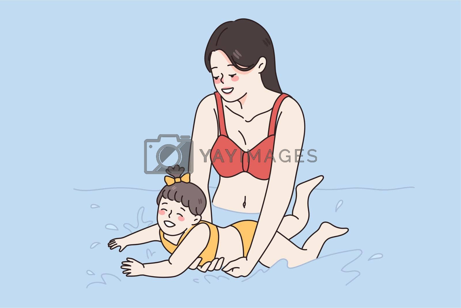 Royalty free image of Learning to swim and happy parenthood concept. by Vasilyeva