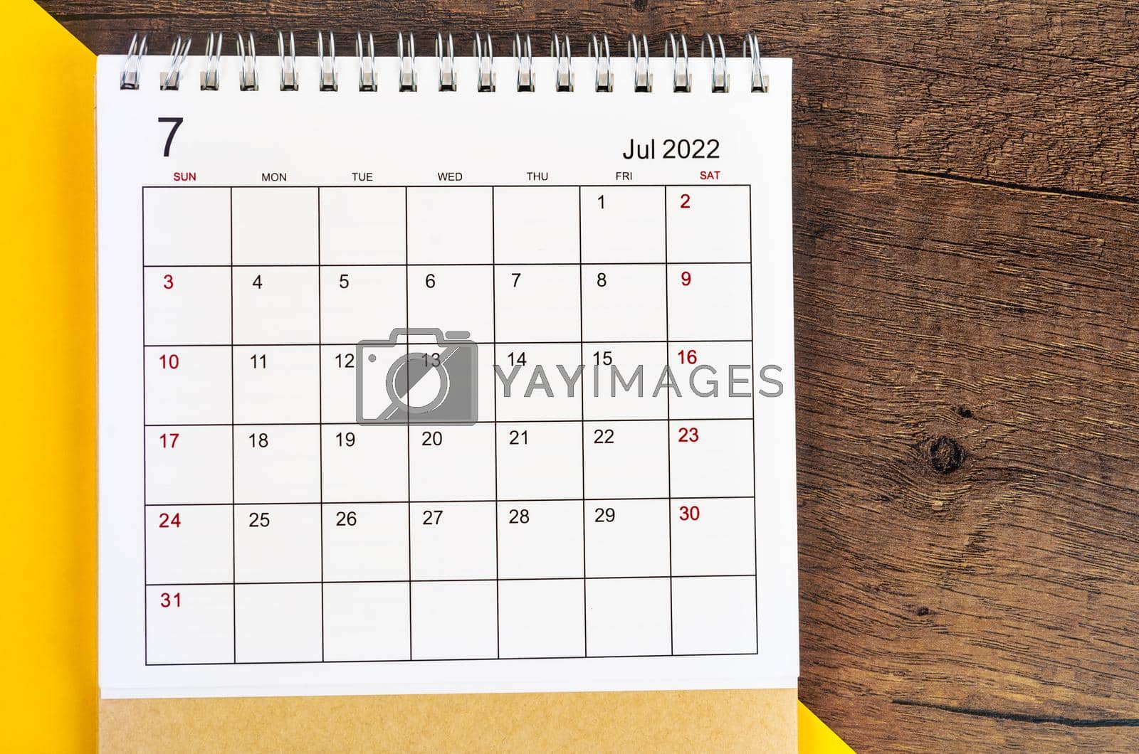 Royalty free image of July 2022 desk calendar by Gamjai