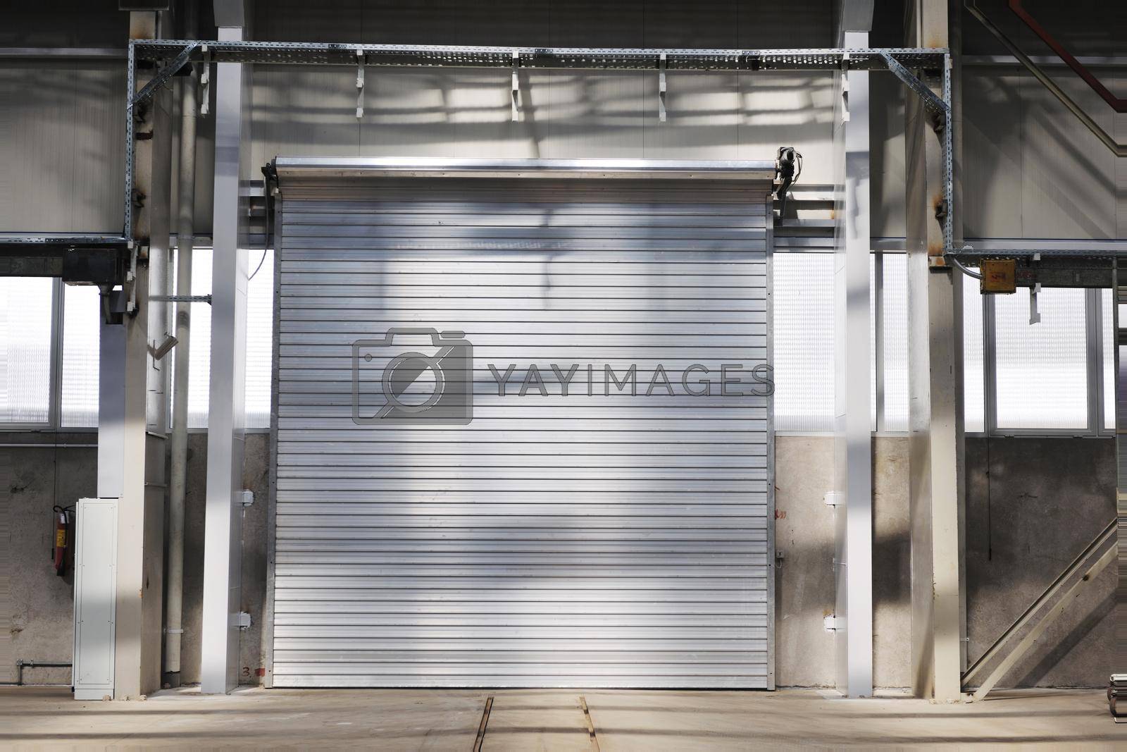 Royalty free image of big industry garage door by dotshock