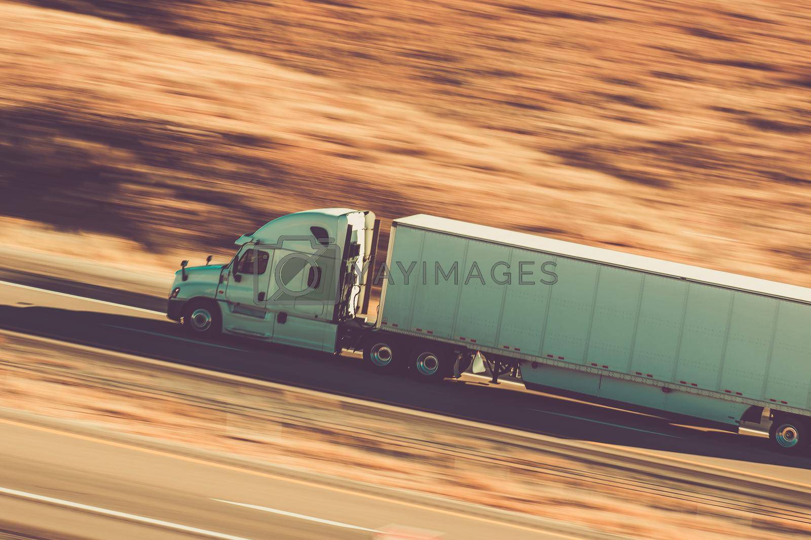 Royalty free image of Cross Country Semi Truck Transport Concept by welcomia