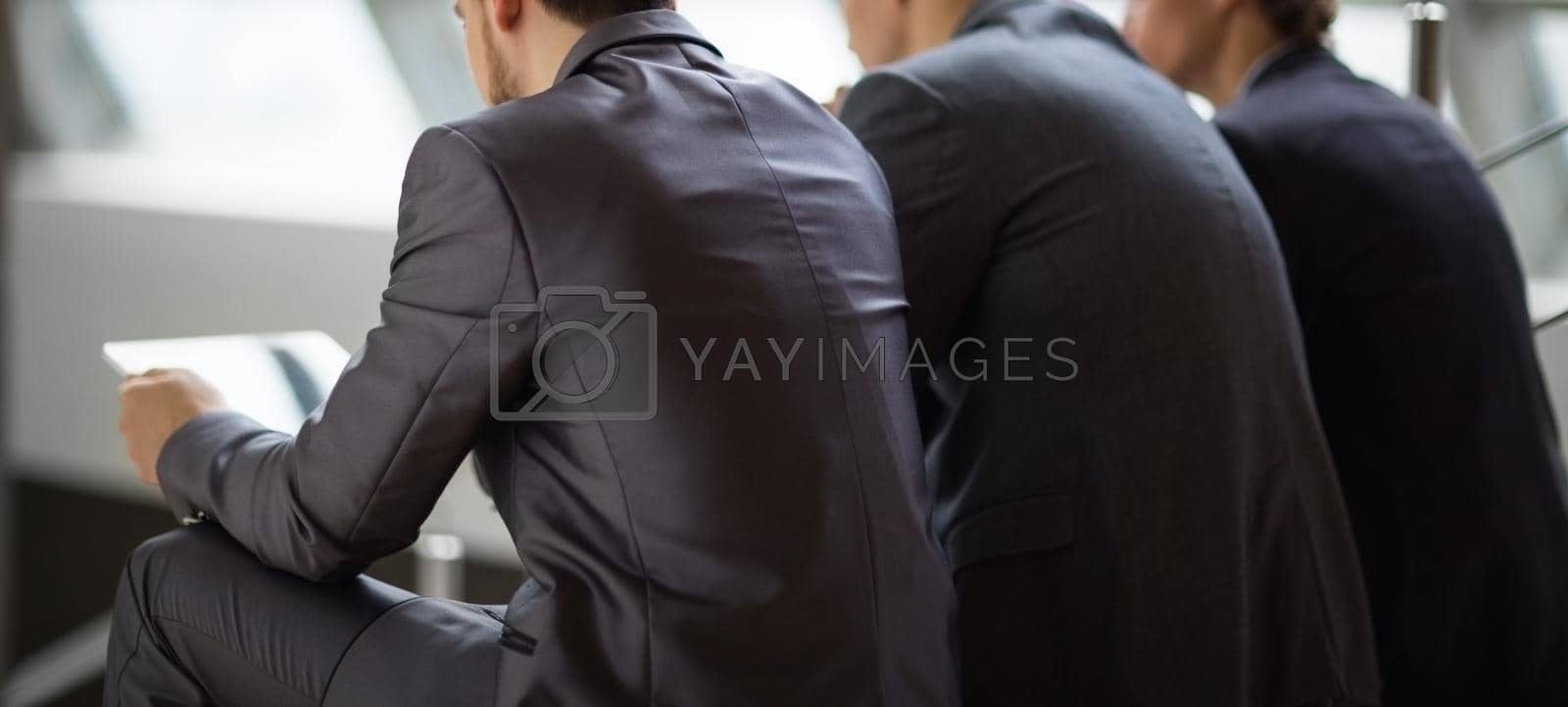Royalty free image of Portrait of smart business partners communicating at meeting by SmartPhotoLab