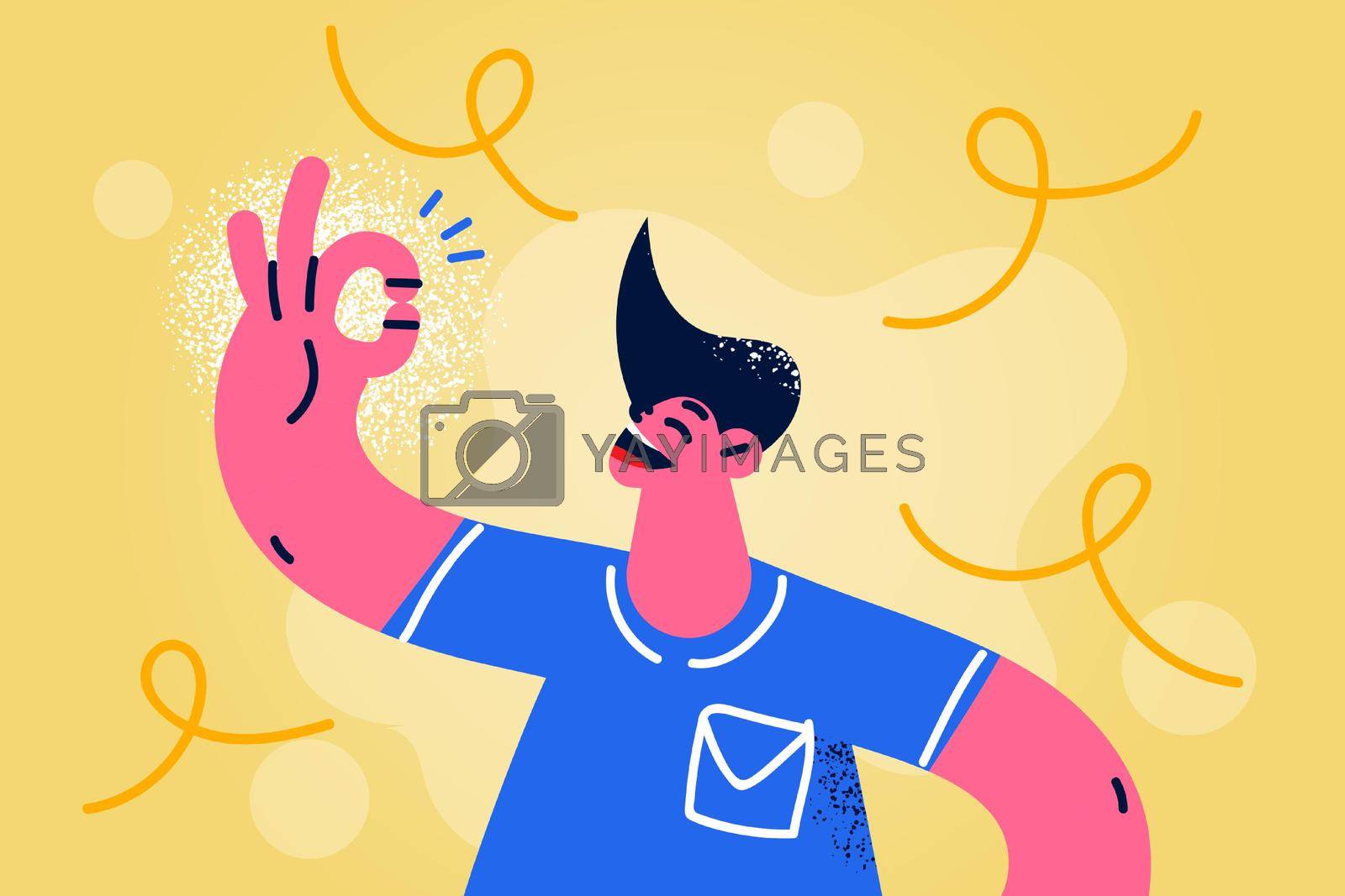 Royalty free image of Smiling man show ok hand gesture by Vasilyeu