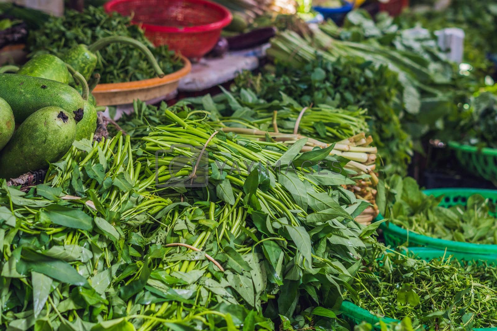 Royalty free image of Greenery in the Vietnamese market. Asian cuisine concept by galitskaya