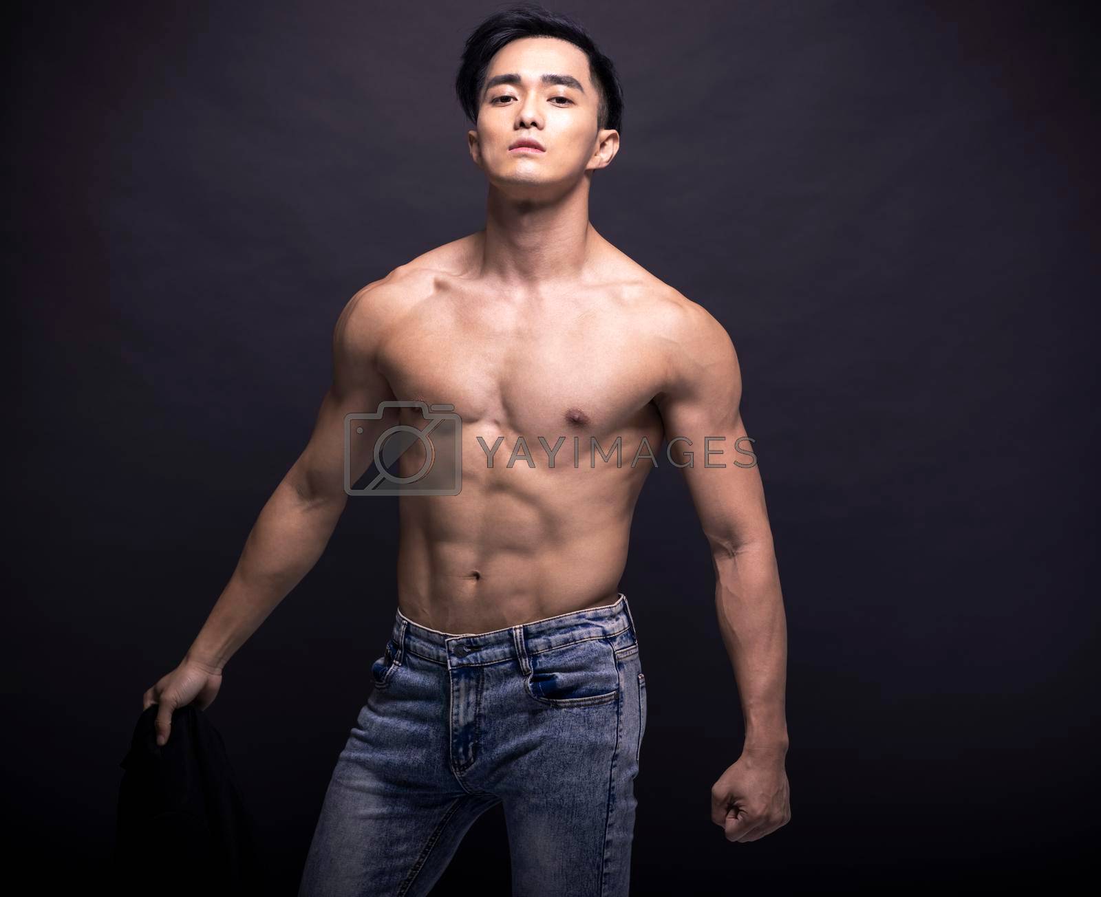 Asian young man with fitness body