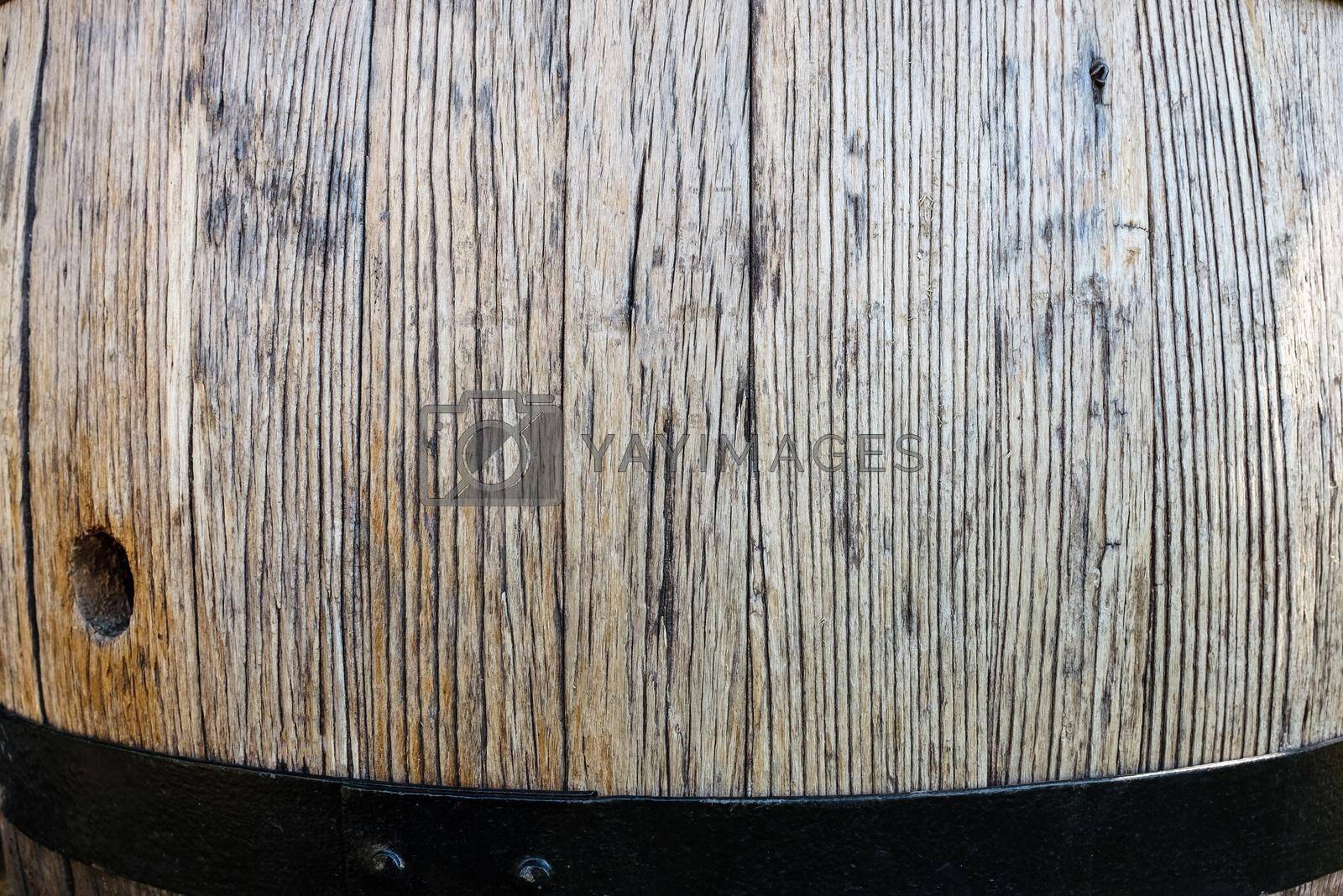 Royalty free image of Wine Barrels in Dark Cellar by AlexGrec