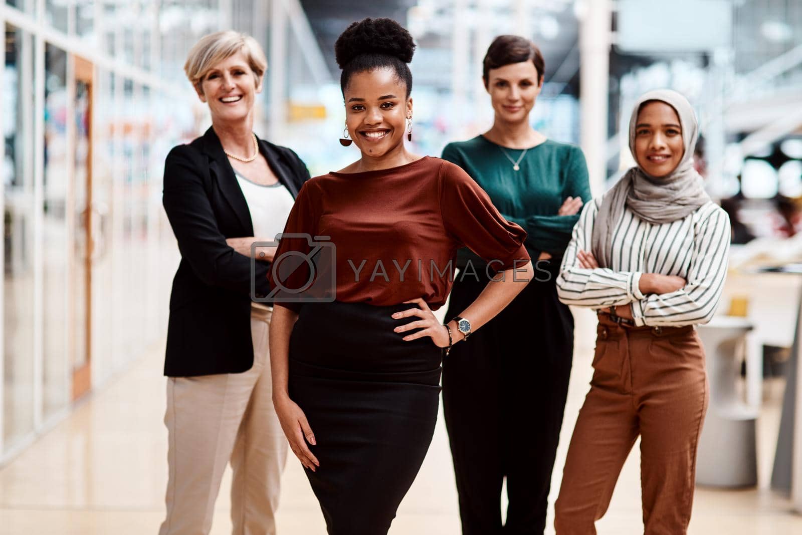 Royalty free image of Behind every successful woman is a tribe of women who have her back by YuriArcurs